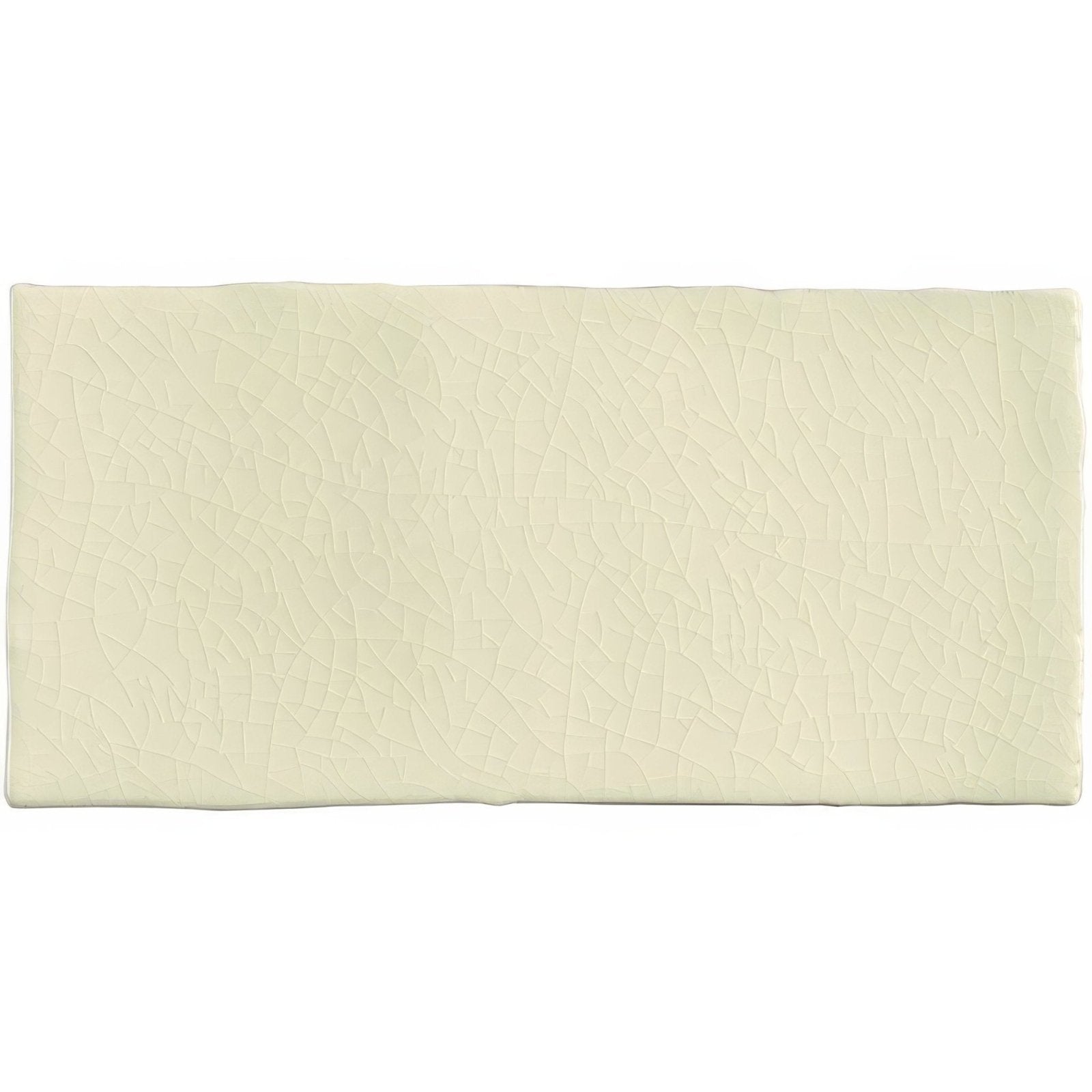 Cream-colored half tile dune bath mat with subtle textured surface for bathroom use