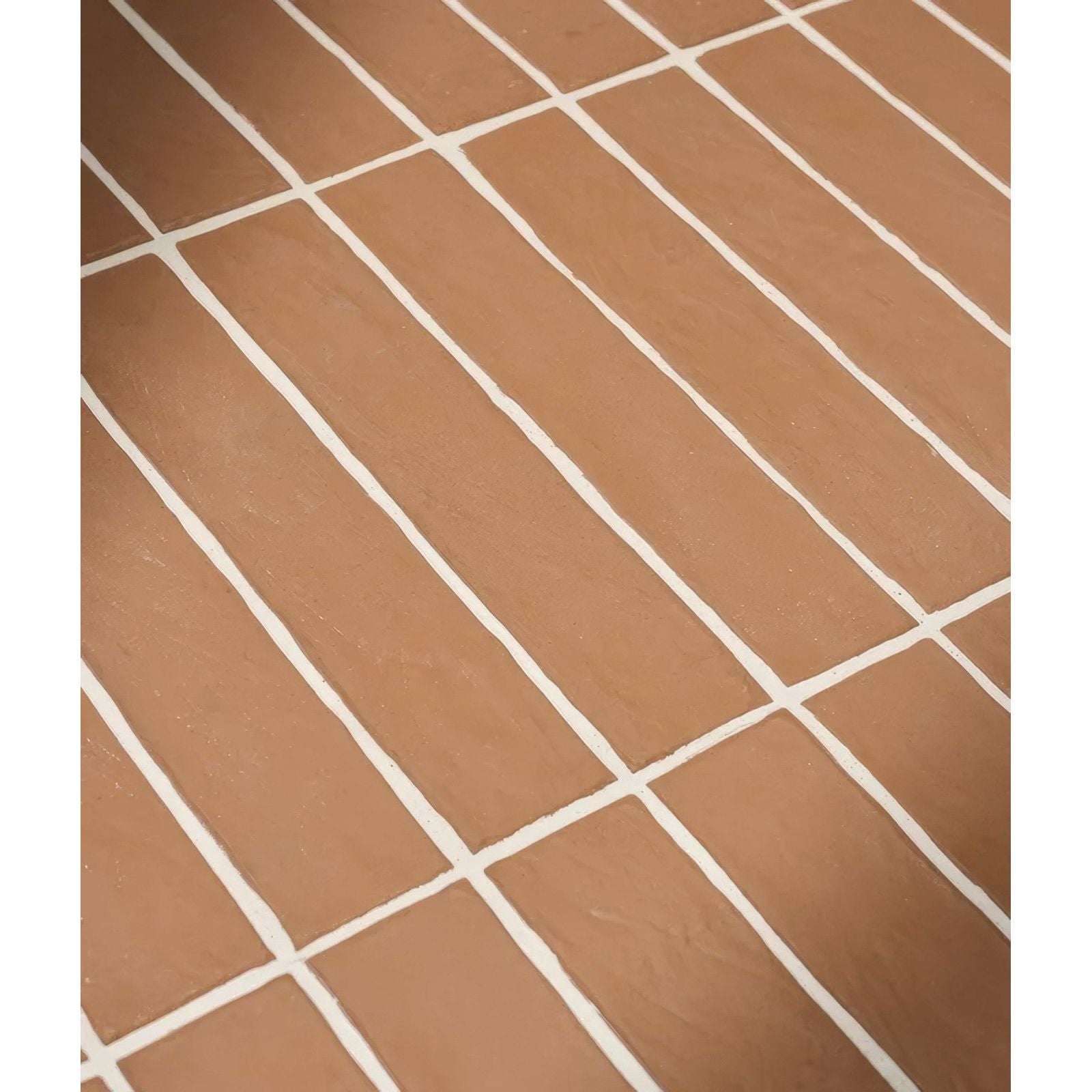 Earthenware porcelain coral rectangular terracotta tiles with white grout lines for flooring and walls