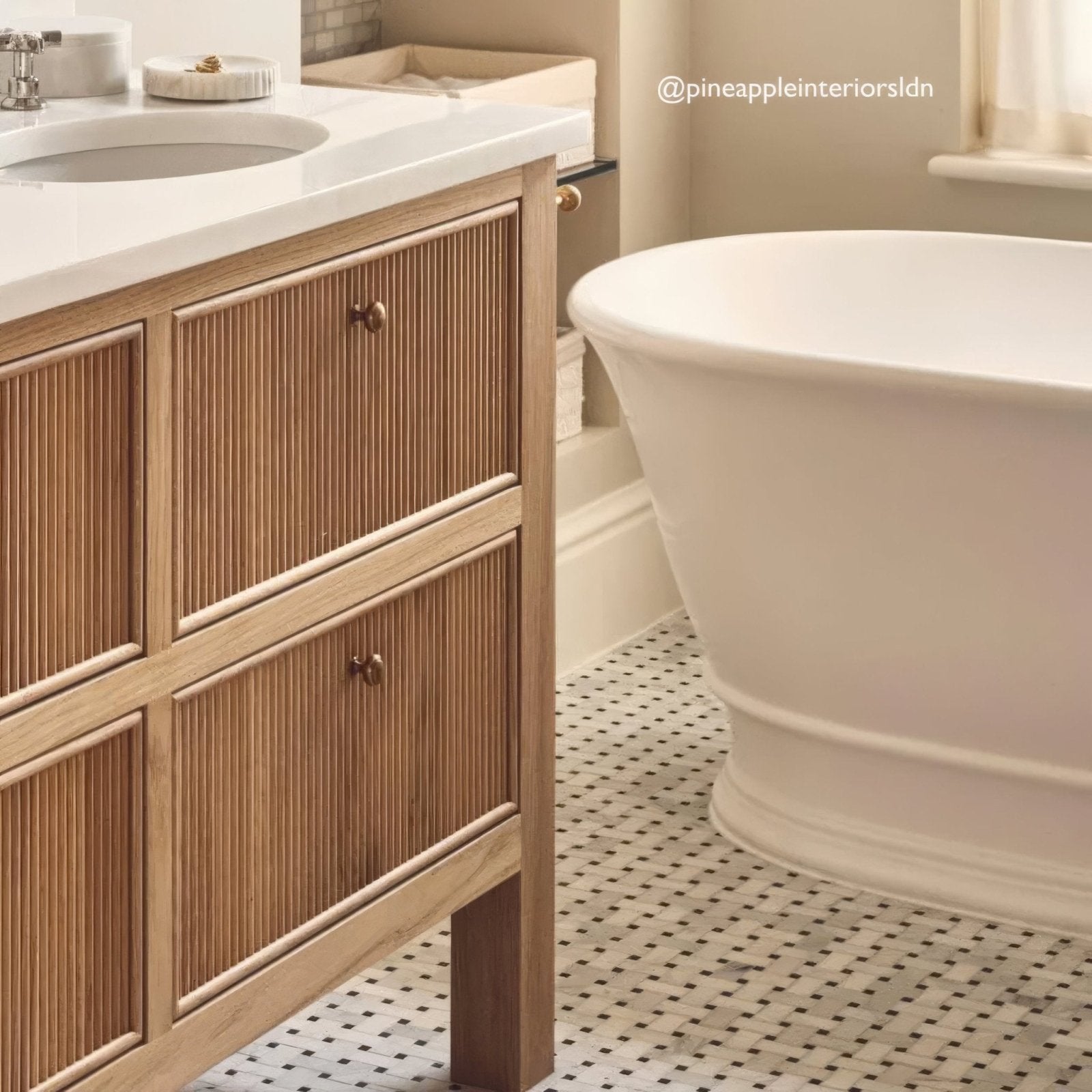 East Hampton Basketweave Marble Mosaic white and black marble basketweave mosaic with a light wood slatted vanity