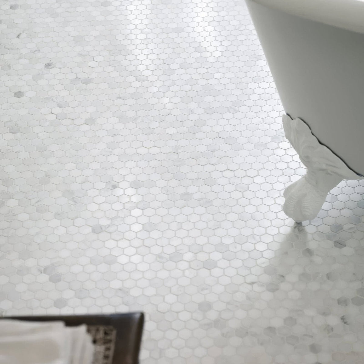 White hexagonal marble mosaic tile floor featuring east hampton hexagon marble mosaic design