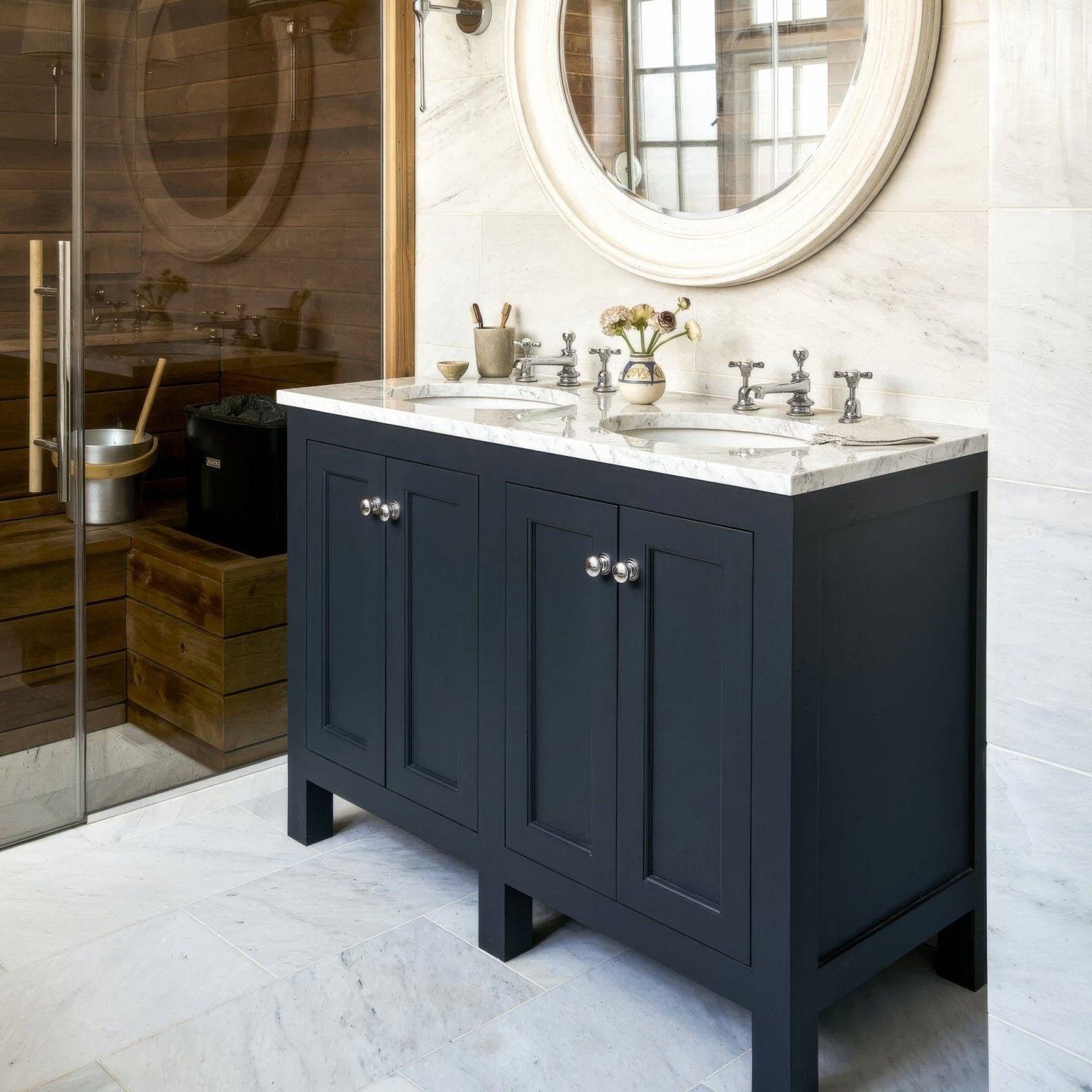 East Hampton Marble Tile 30x60cm white marble tiles on a dark blue vanity with double sinks