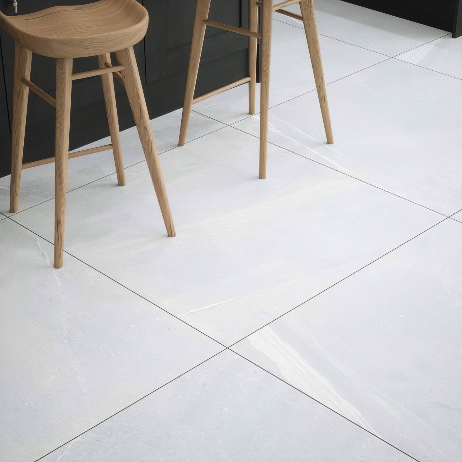 Eastford Pearl Matt porcelain white marble-effect floor tiles with subtle gray veining and thin black grout lines
