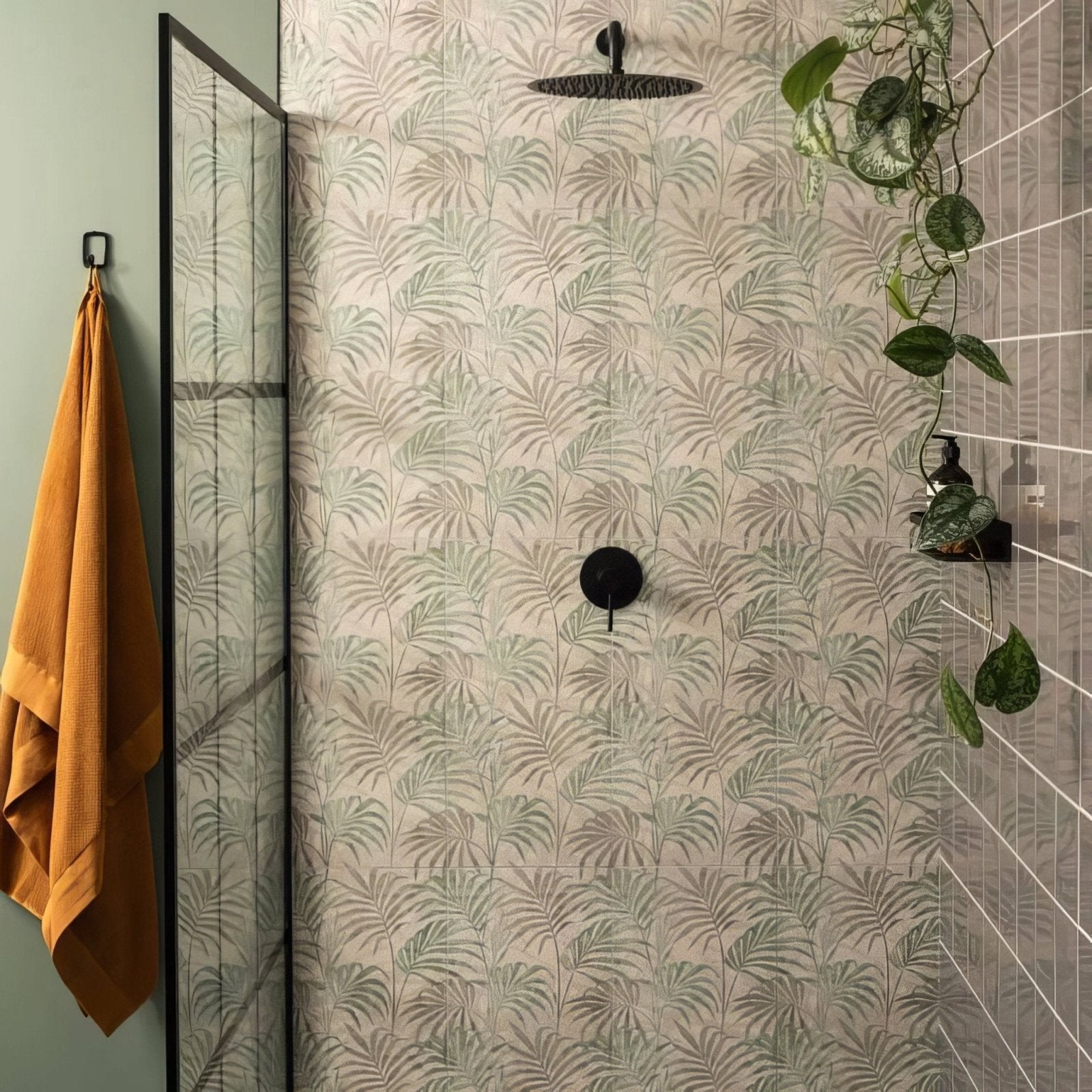 Eden Hothouse 60x30cm showerhead is a sleek matte black round rain-style wall-mounted fixture