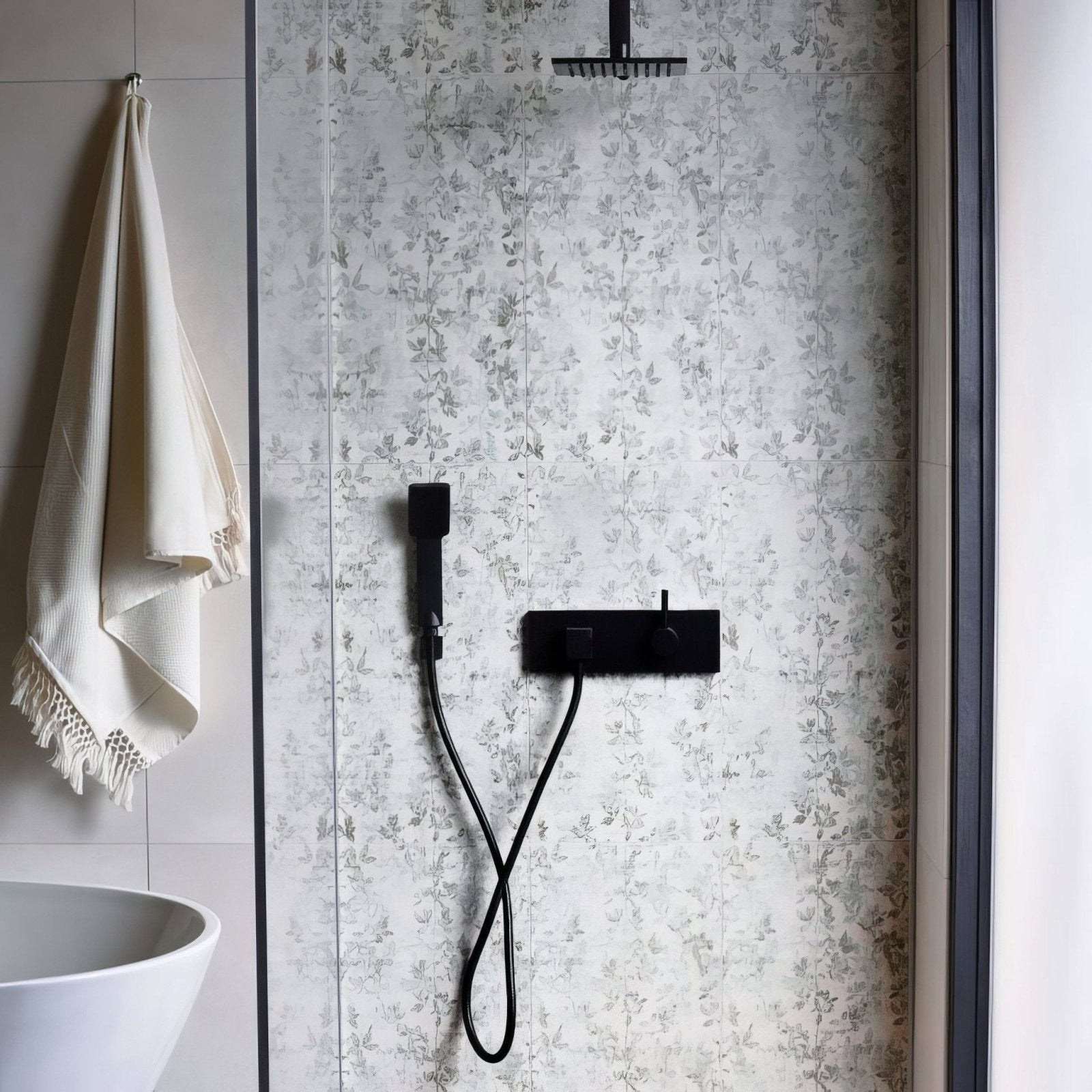 Eden pergola 60x30cm black matte-finish showerhead and faucet assembly with sleek modern design on patterned tiles