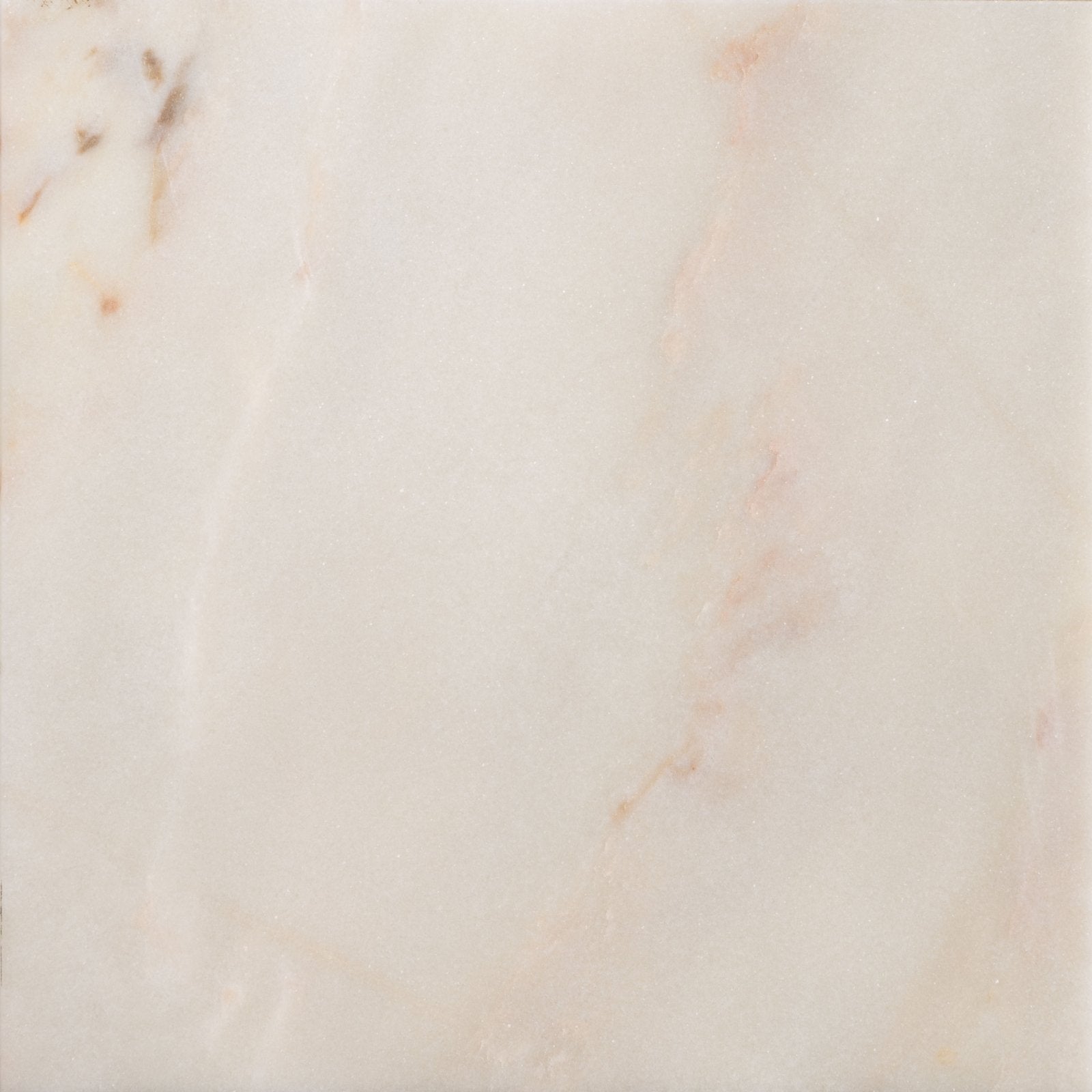 Cream-colored elixir marble cashmere honed tile with subtle peach and beige veining for elegant flooring or walls
