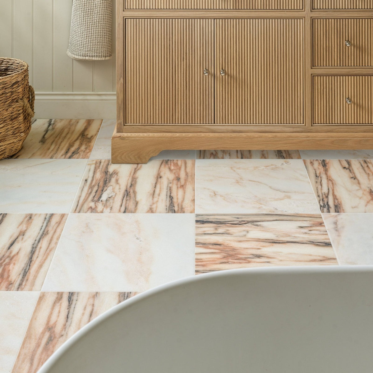 Elixir Marble Oud Rose Honed square marble tiles in soft rose tones with natural veining