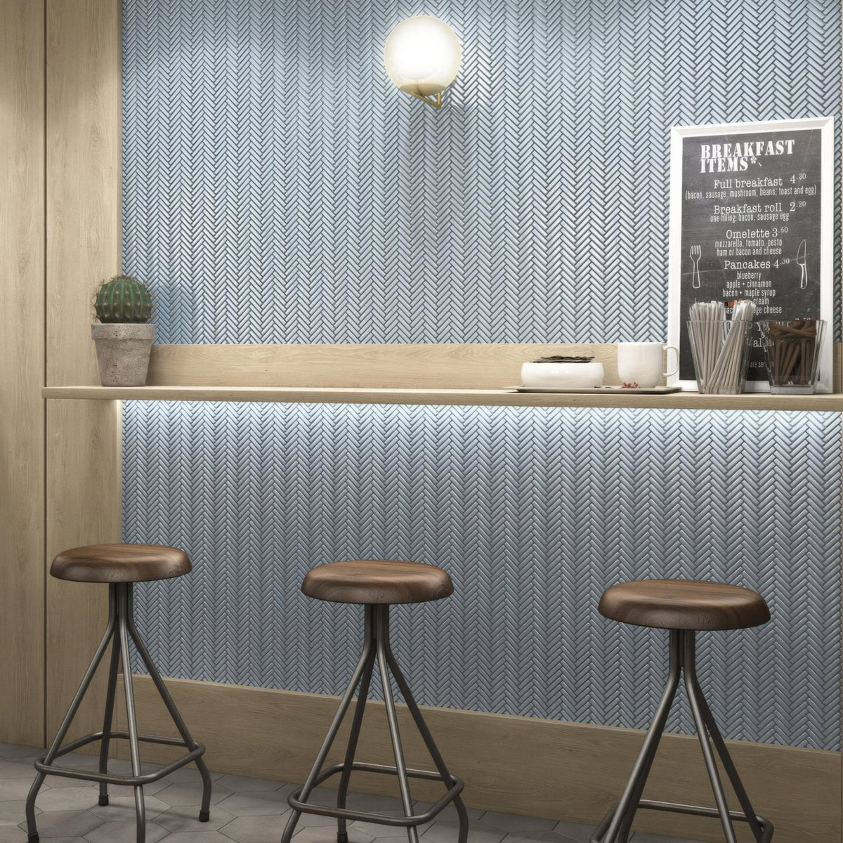 Elle 28.3 x 28.3cm blue ceramic wall tile with a herringbone pattern for interior wall decoration