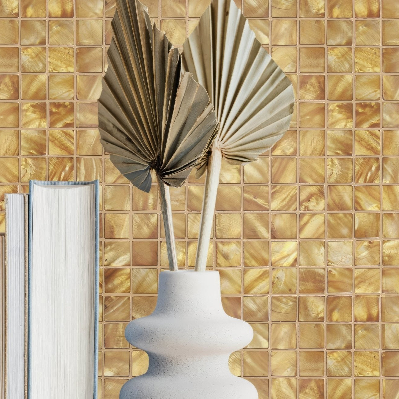 Emerald Gold 25mm Square gold mosaic with a tiered white vase of dried palm fronds