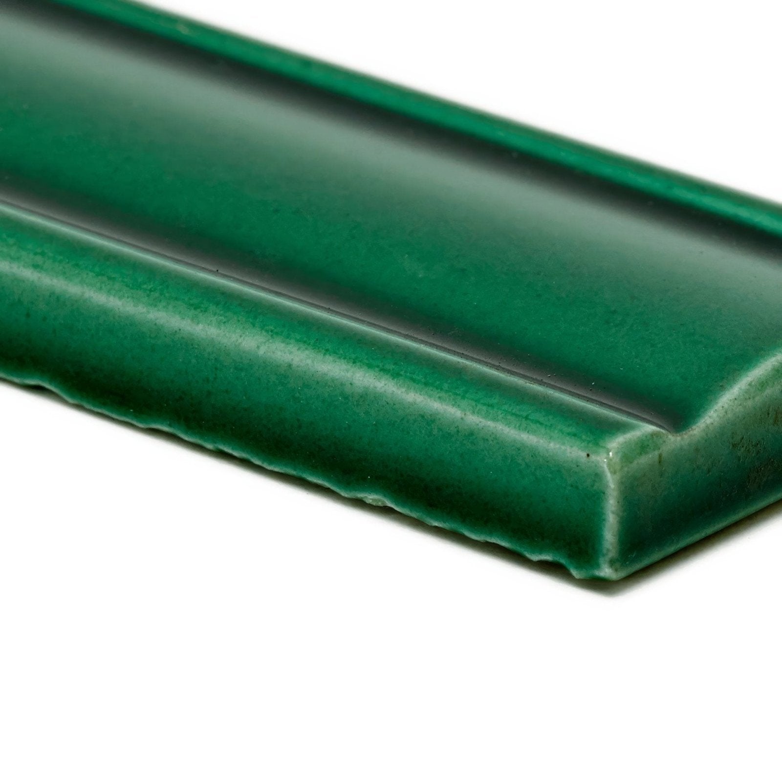 Deep green empress dado malachite ceramic tile with glossy finish and subtle textured edges