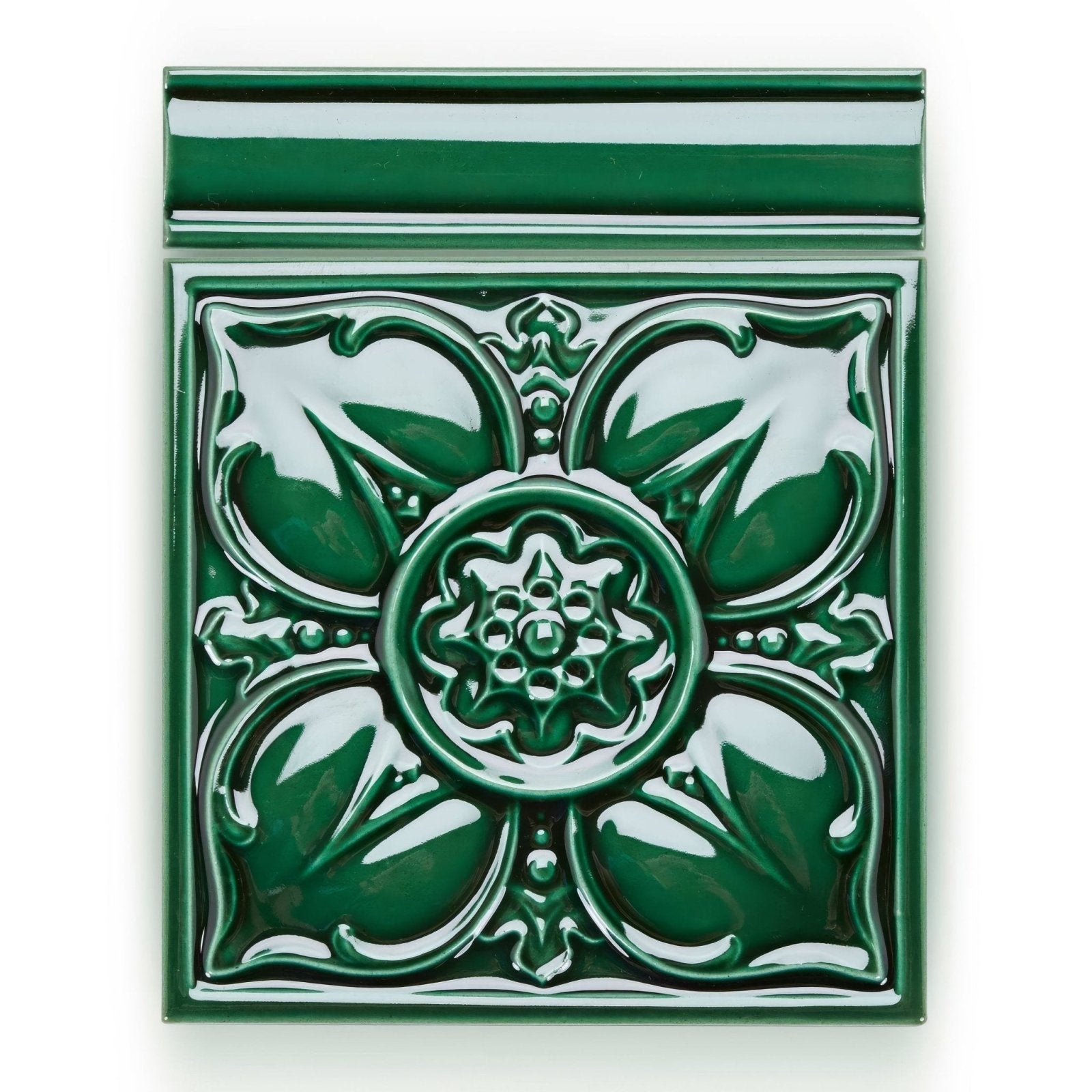 Deep green ceramic wall tile with raised floral design and glossy finish from empress dado malachite collection