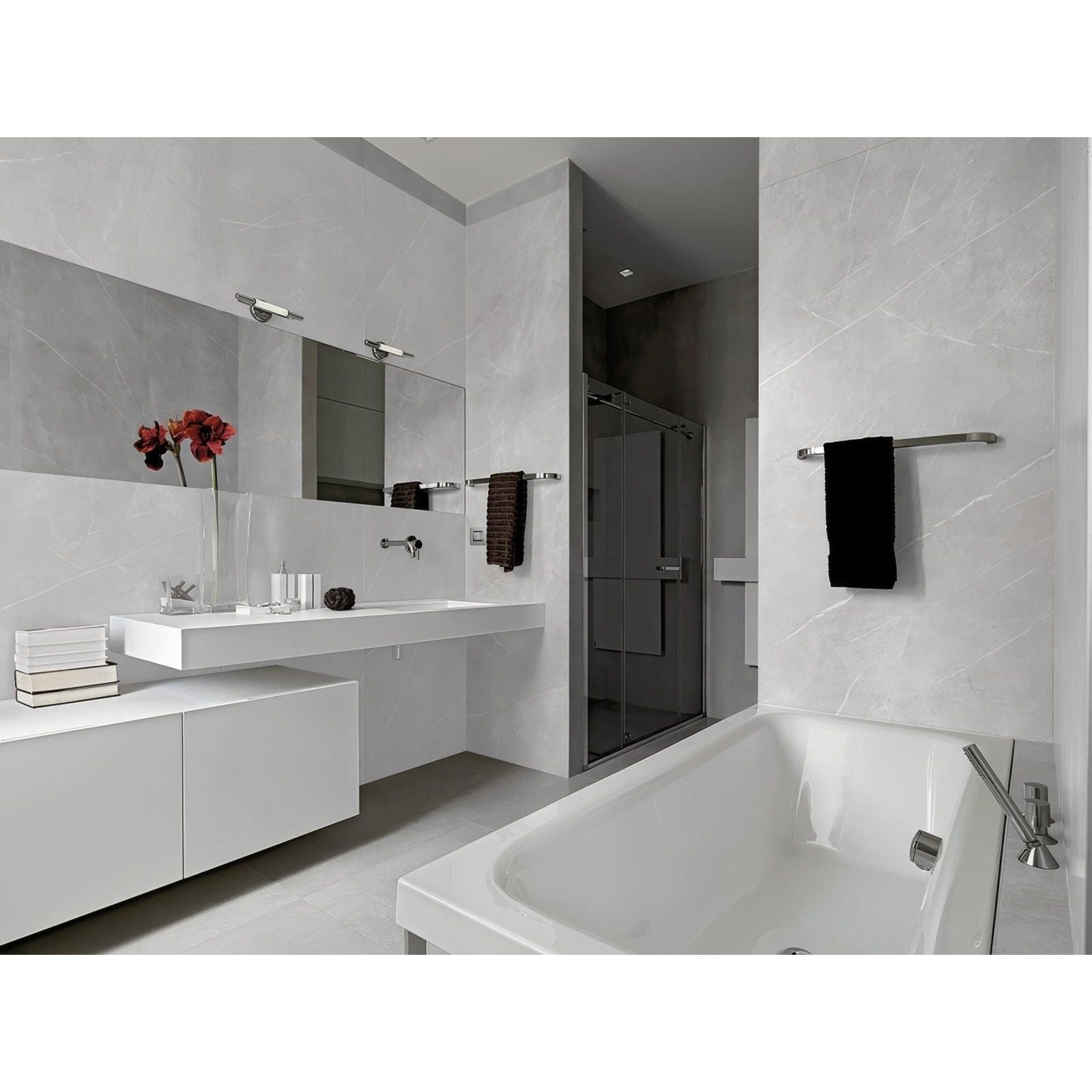 Energy Stone Pietragrey White white marble-effect tiles with a modern bathtub and chrome fixtures
