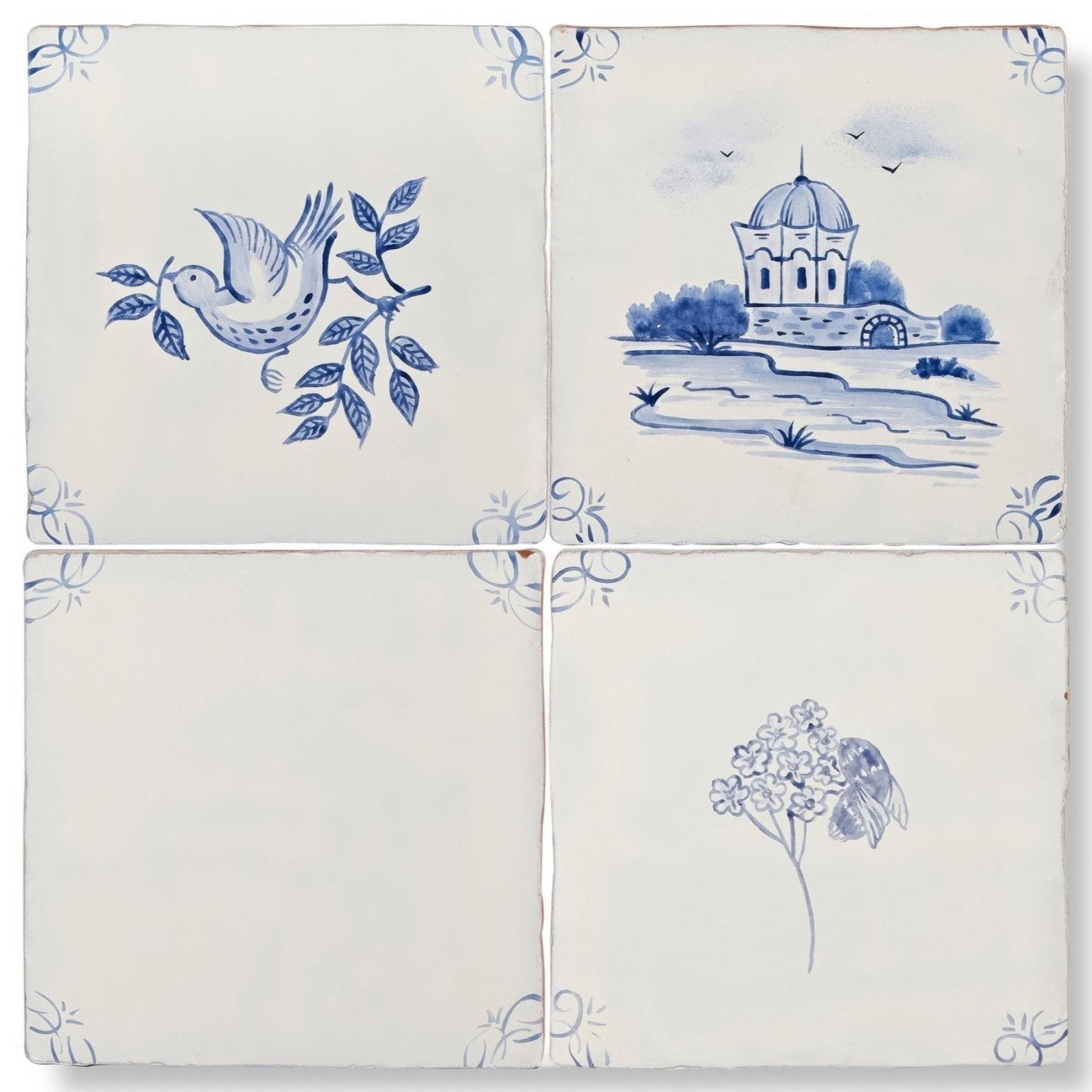 Set of four cream-colored English Delft bee blue gloss ceramic tiles with delicate blue hand-painted designs