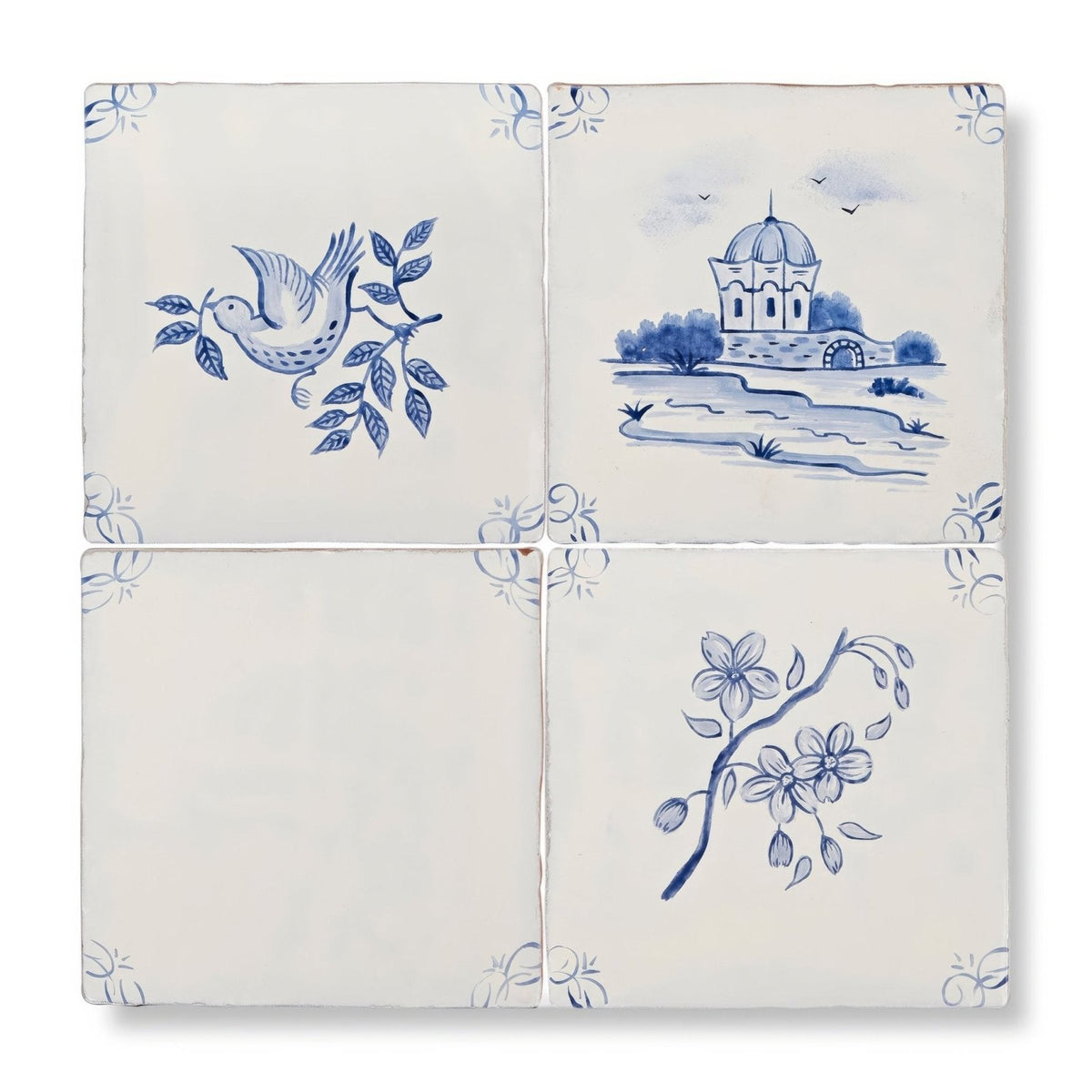 Set of four English delft blossom blue gloss ceramic tiles with hand-painted cobalt blue scenes on creamy white glaze