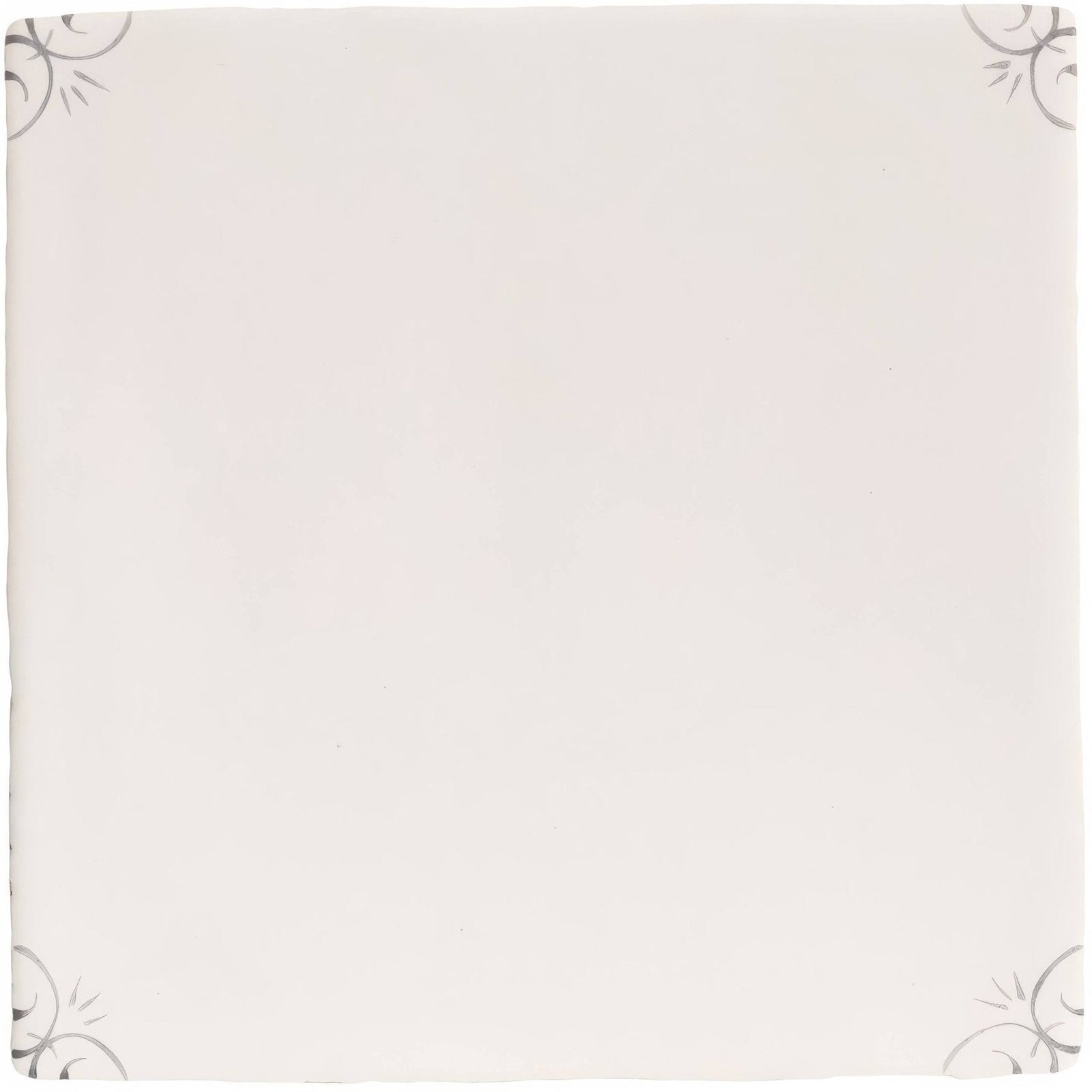 Off-white ceramic English Delft charcoal corners plate with subtle gray floral patterns in each corner