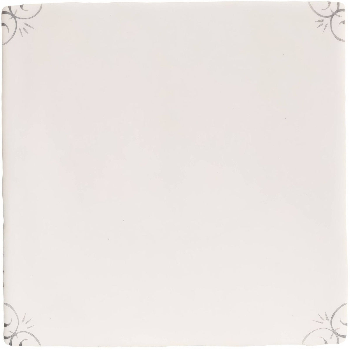 Off-white ceramic English Delft charcoal corners plate with subtle gray floral patterns in each corner