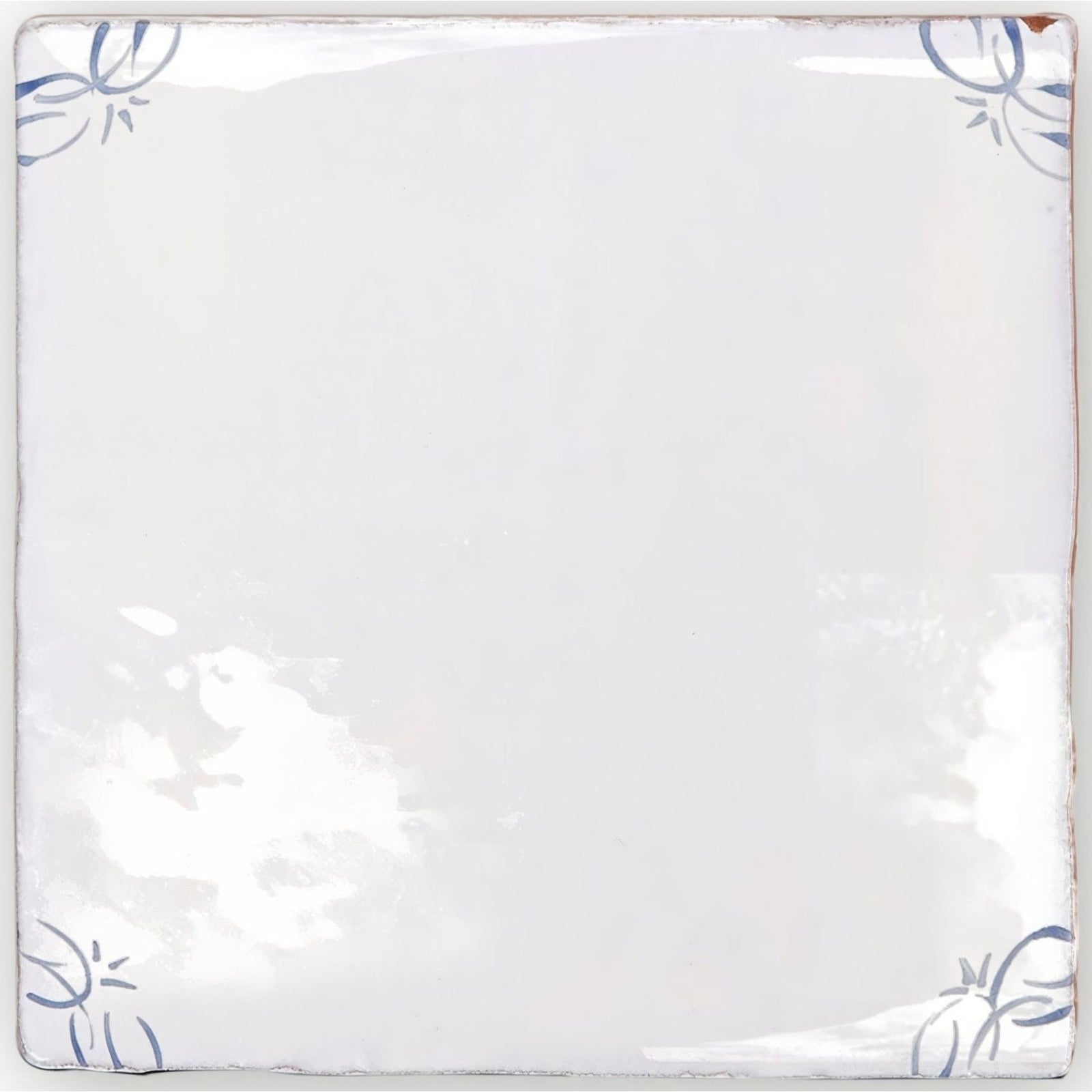 English delft blue gloss corner tile white ceramic with delicate blue floral motifs in each corner