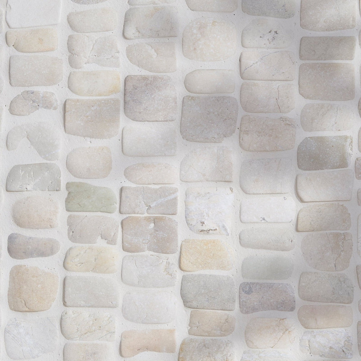 Enso Cobble Mosaic Strip Chalk with white and beige stone mosaic tiles in irregular rectangular staggered pattern