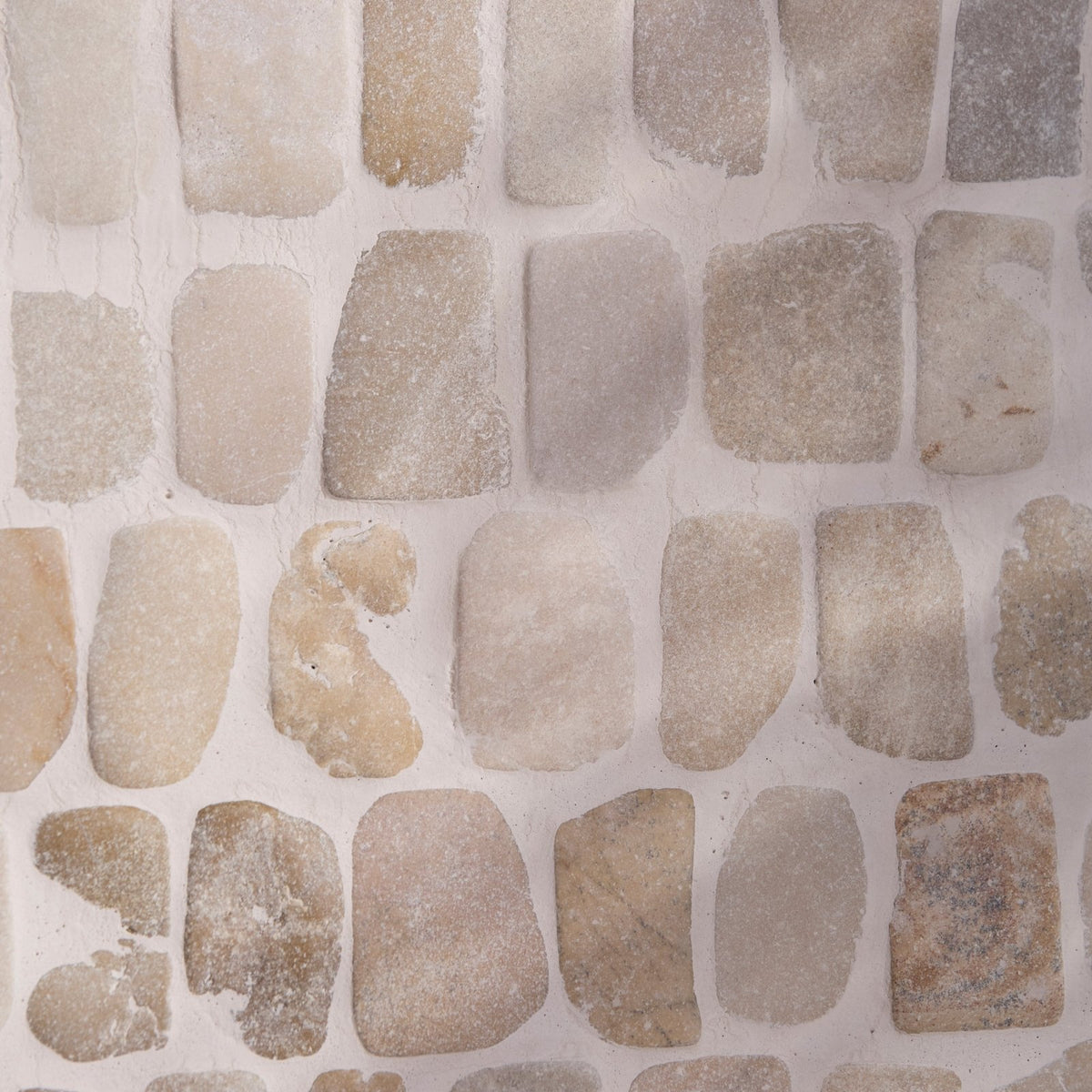 Beige and gray enso cobble mosaic strip sand stone tile with rustic textured surface for decorative wall or floor use