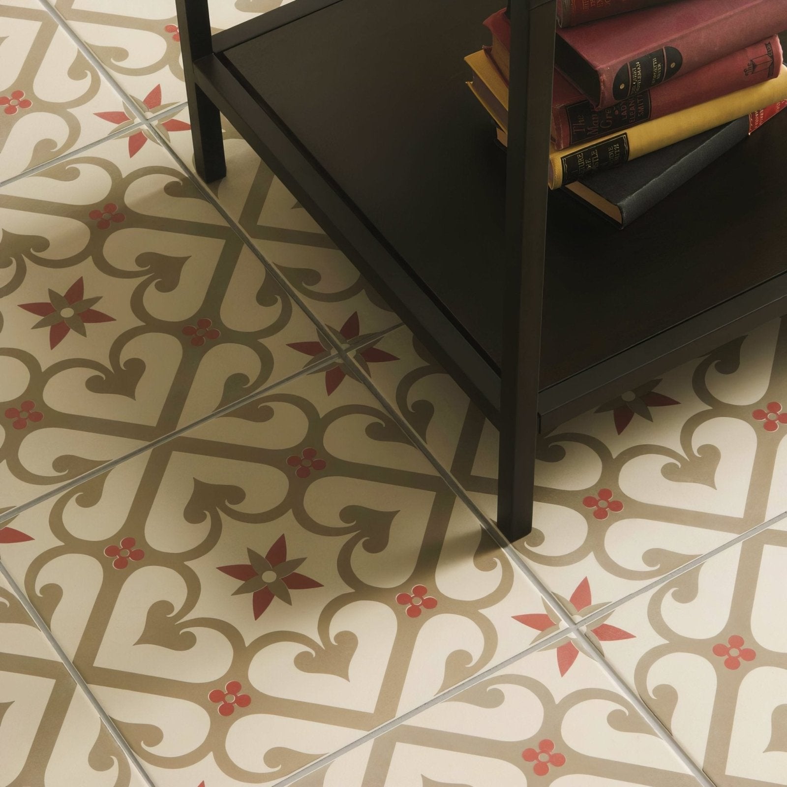 Beige and brown patterned ceramic floor tiles with red floral accents from epogue rose collection