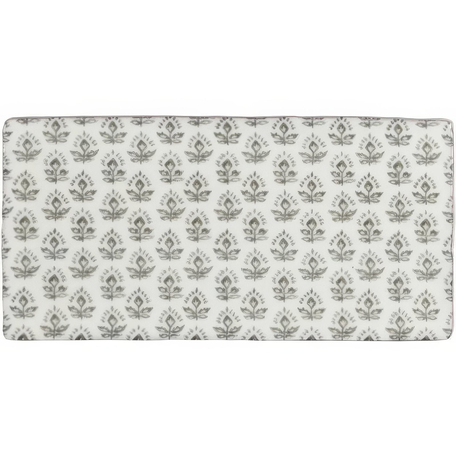 A rectangular fabric cushion in white with a gray intricate damask floral and geometric pattern fabrique picot dove grey