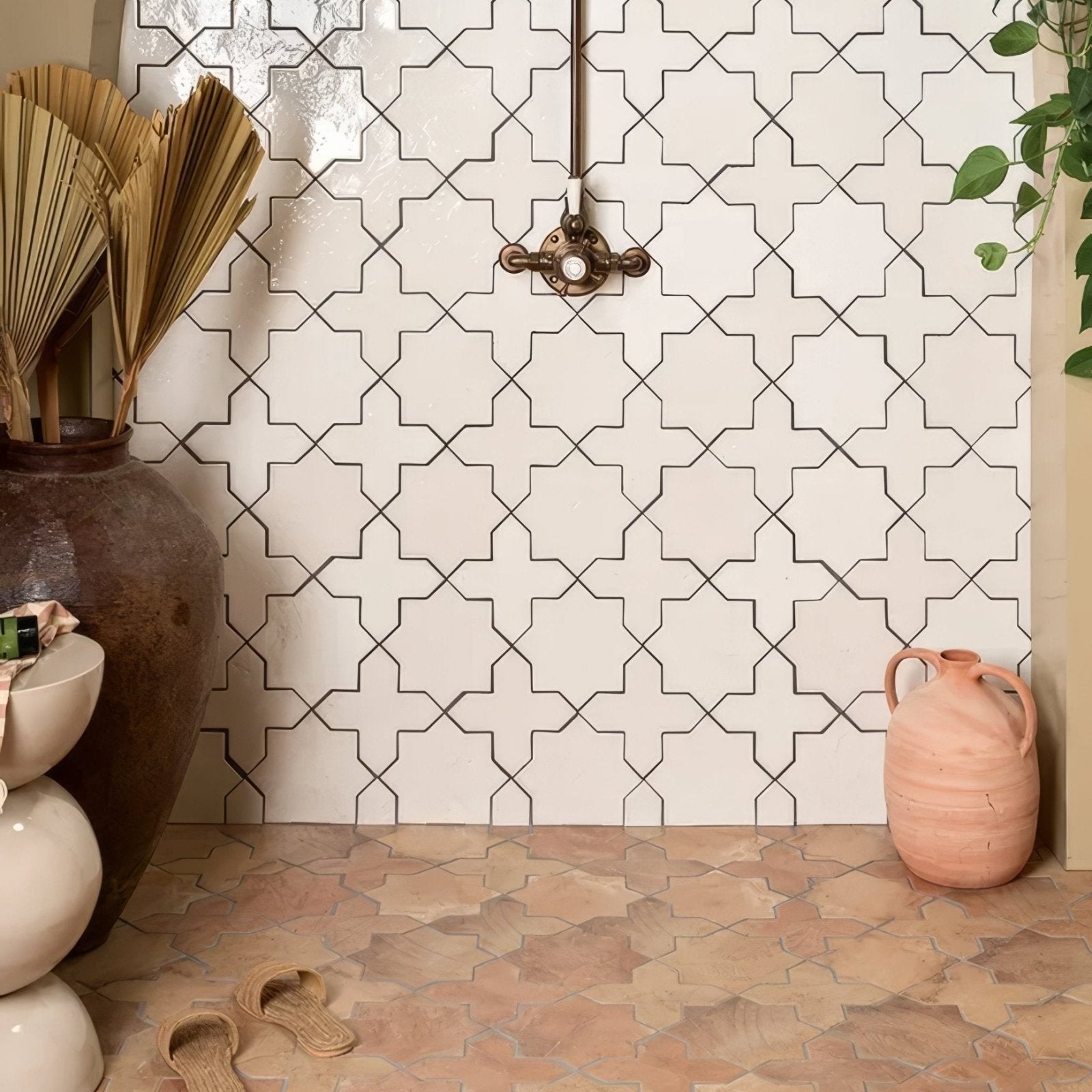 White ceramic fez porcelain star white tiles with black geometric outlines forming a patterned wall design