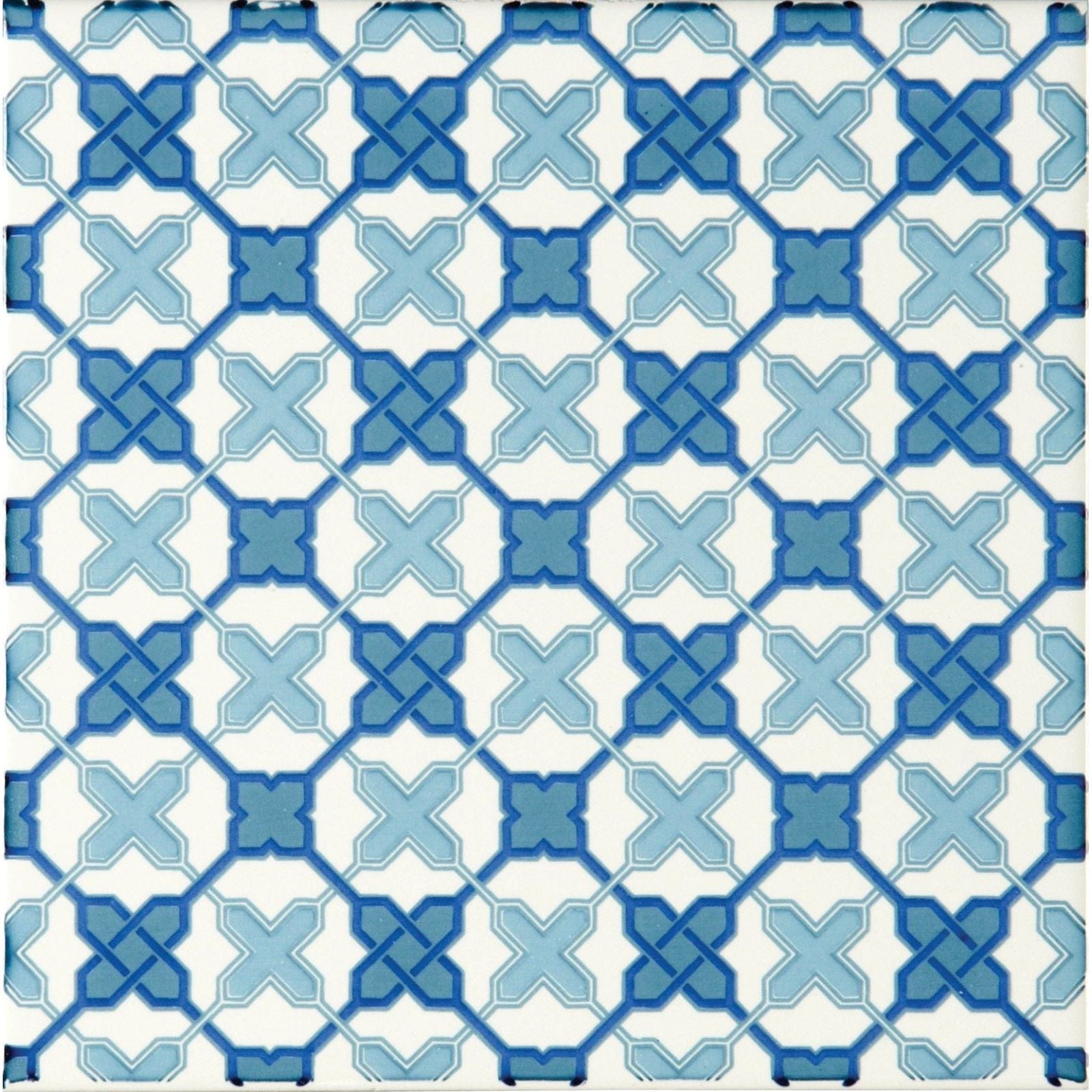 Filigree blue on brilliant white ceramic tile with blue and white geometric interlocking cross pattern design