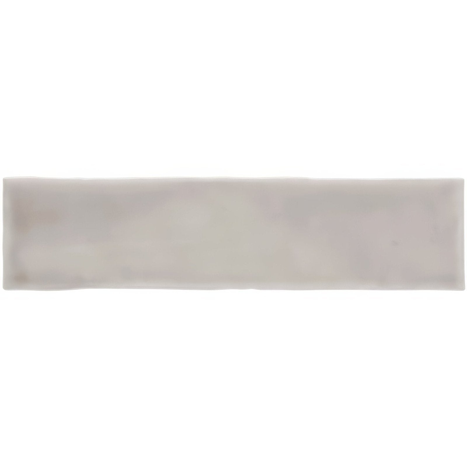 A sleek rectangular ceramic flint large brick tile with a smooth matte finish in soft off-white hue