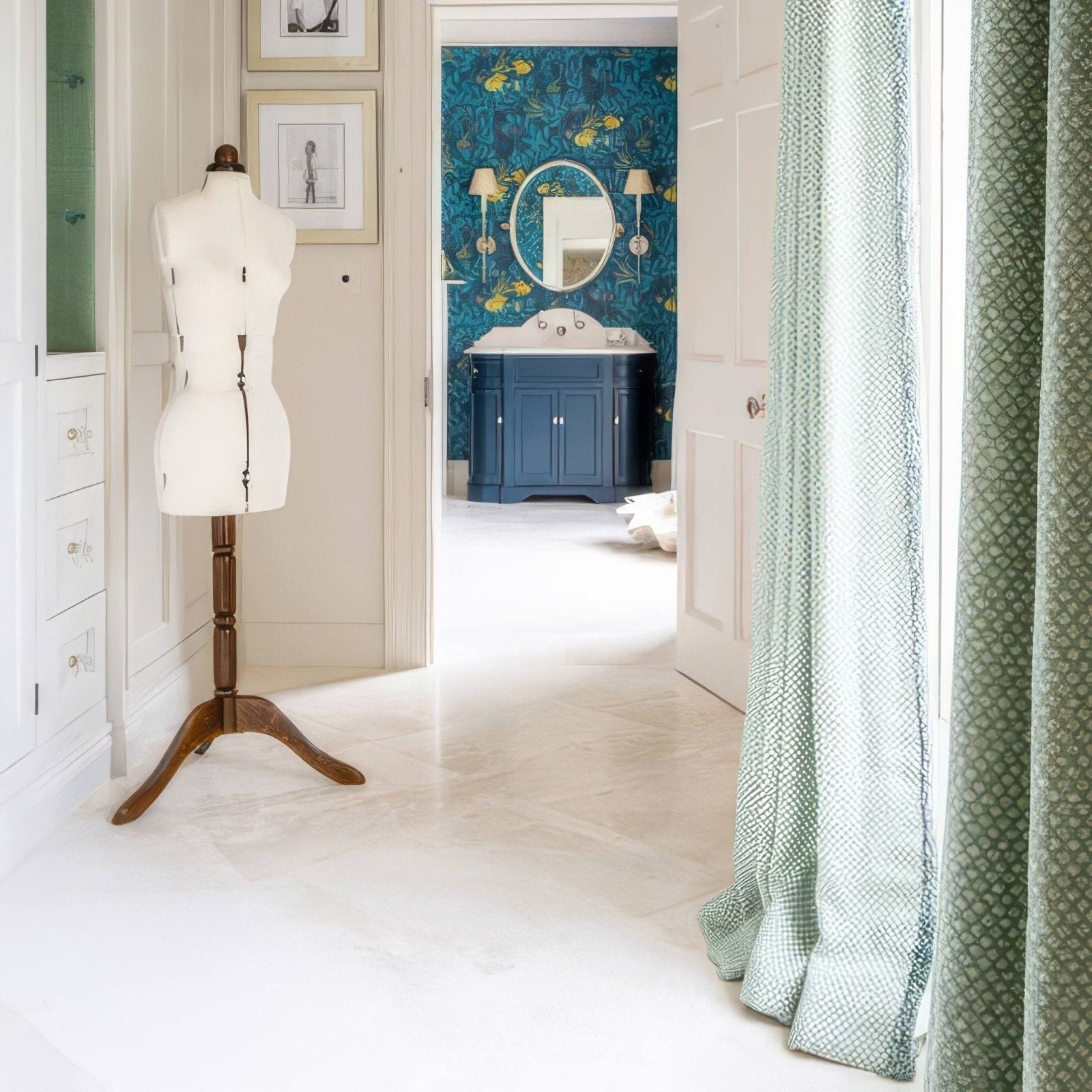White fabric mannequin on wooden tripod stand next to folio marble honed finish 61 x 61cm tile