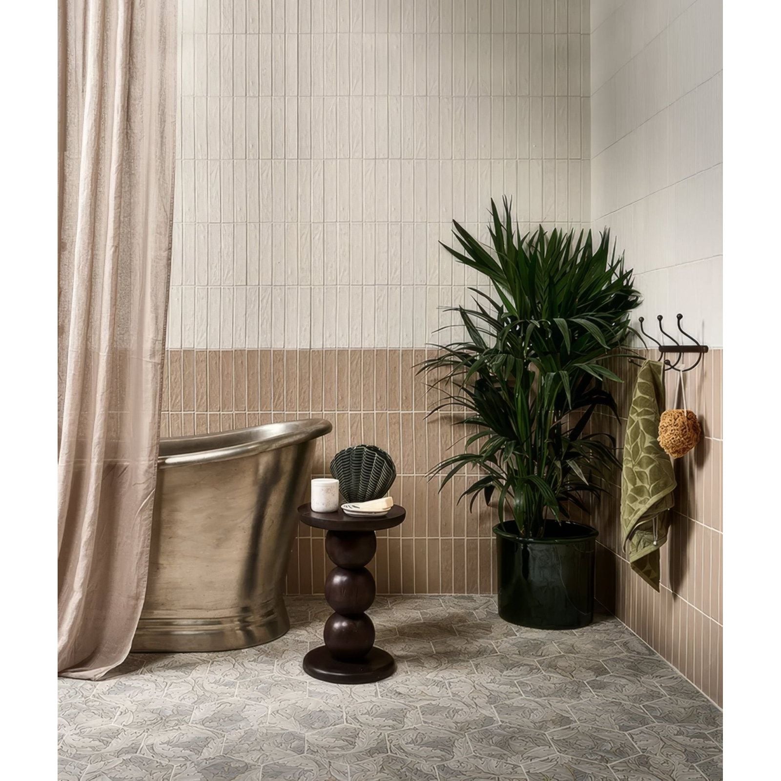 A sleek metallic porcelain bathtub in sand matt finish with curved design and polished surface