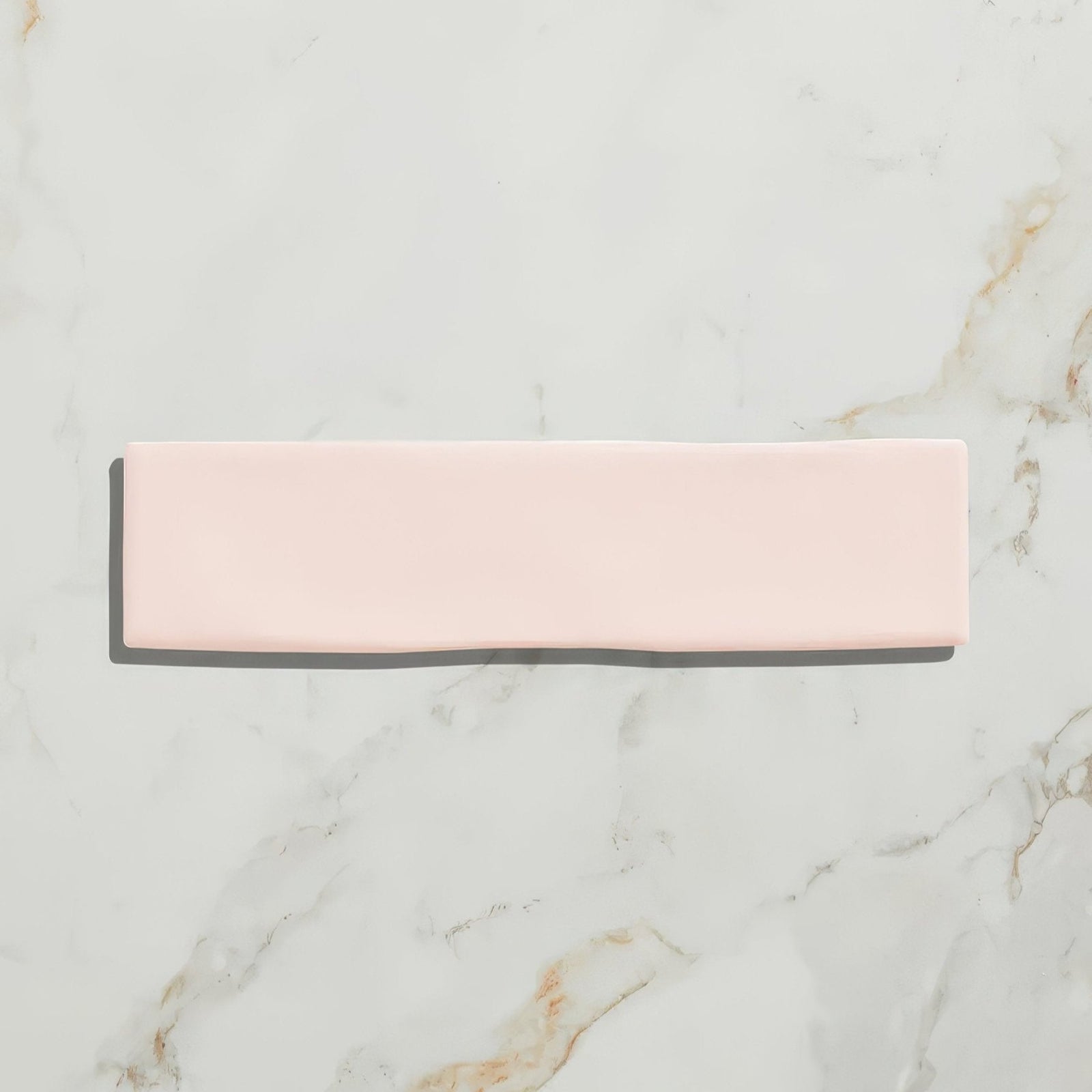 A sleek matte-finished rectangular ceramic tile in soft blush pink from fondant ceramic rose collection