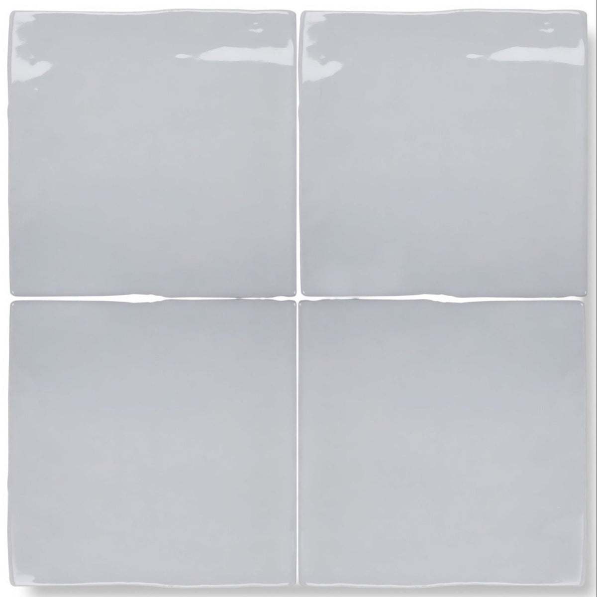 Four square glossy light gray ceramic tiles arranged in a grid forecast cromarty square glazed tile