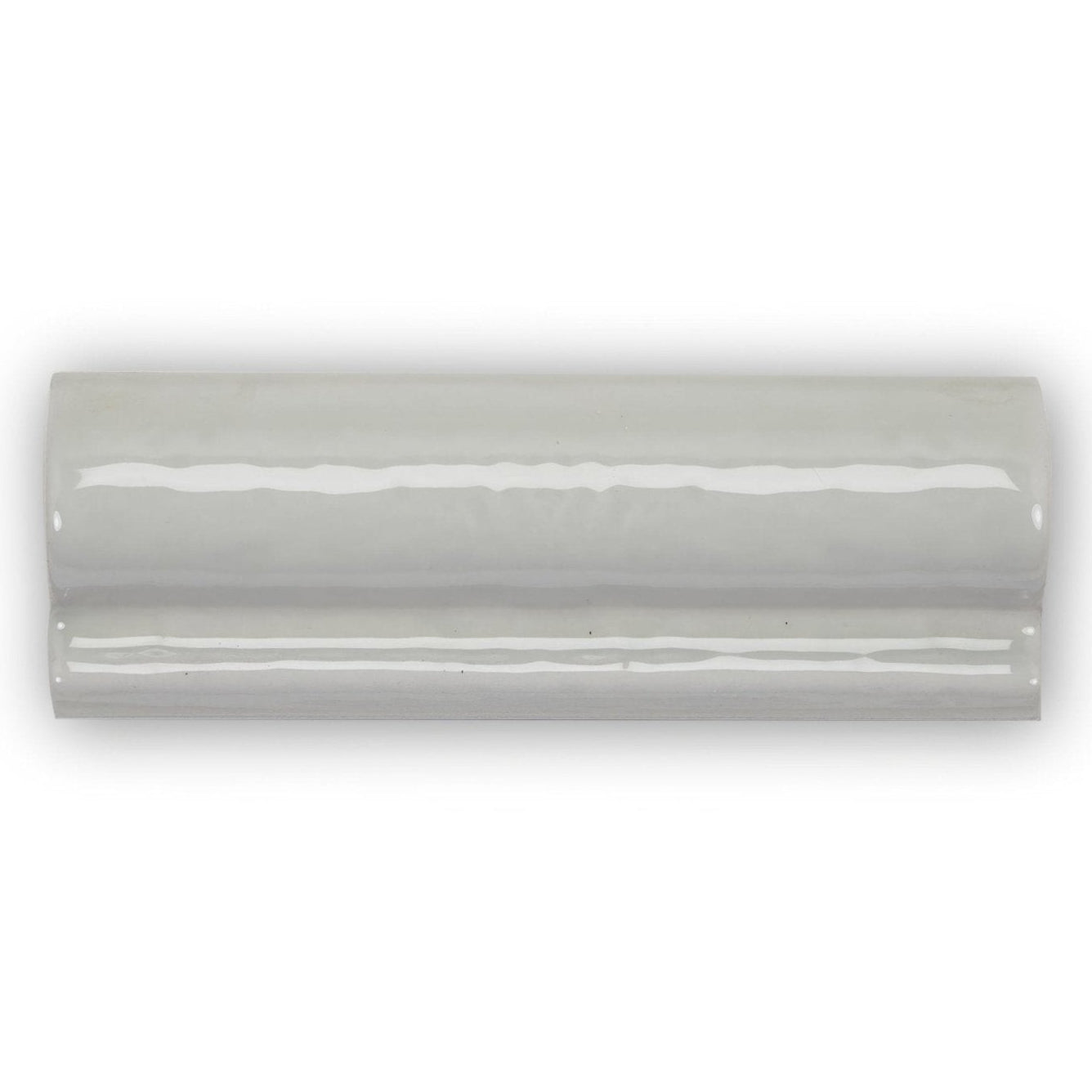 A sleek glossy white ceramic tile with smooth curved edge and subtle horizontal ridges from forecast portland glazed dado