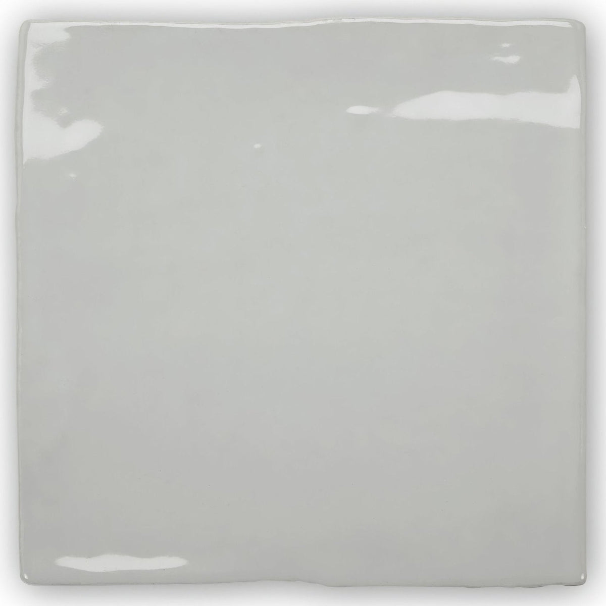 Forecast portland square glazed tile featuring a glossy gray ceramic surface with slightly uneven edges and subtle highlights