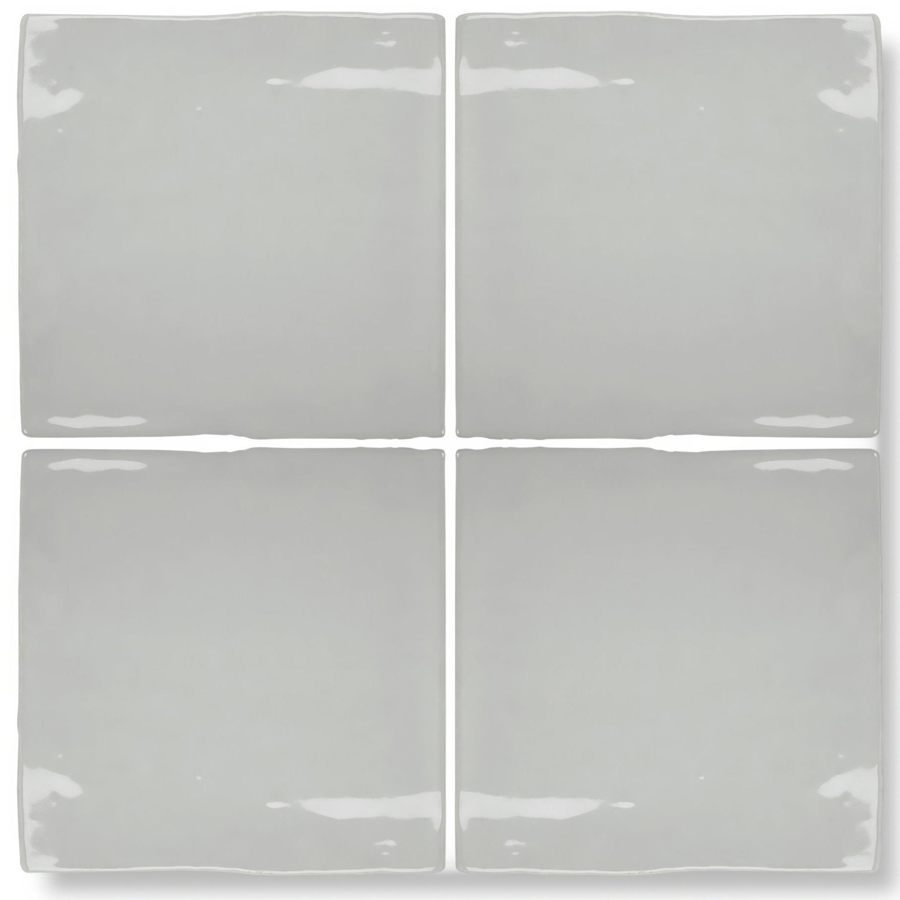 Four square forecast portland glazed ceramic tiles in matte gray with uneven edges and subtle glossy highlights