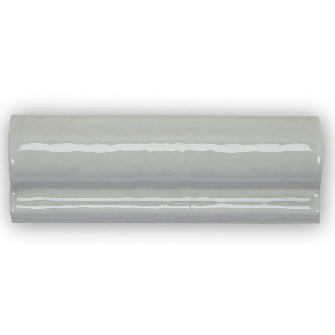A sleek light gray Forecast Rockall glazed dado ceramic tile with smooth curved edges and subtle reflective highlights