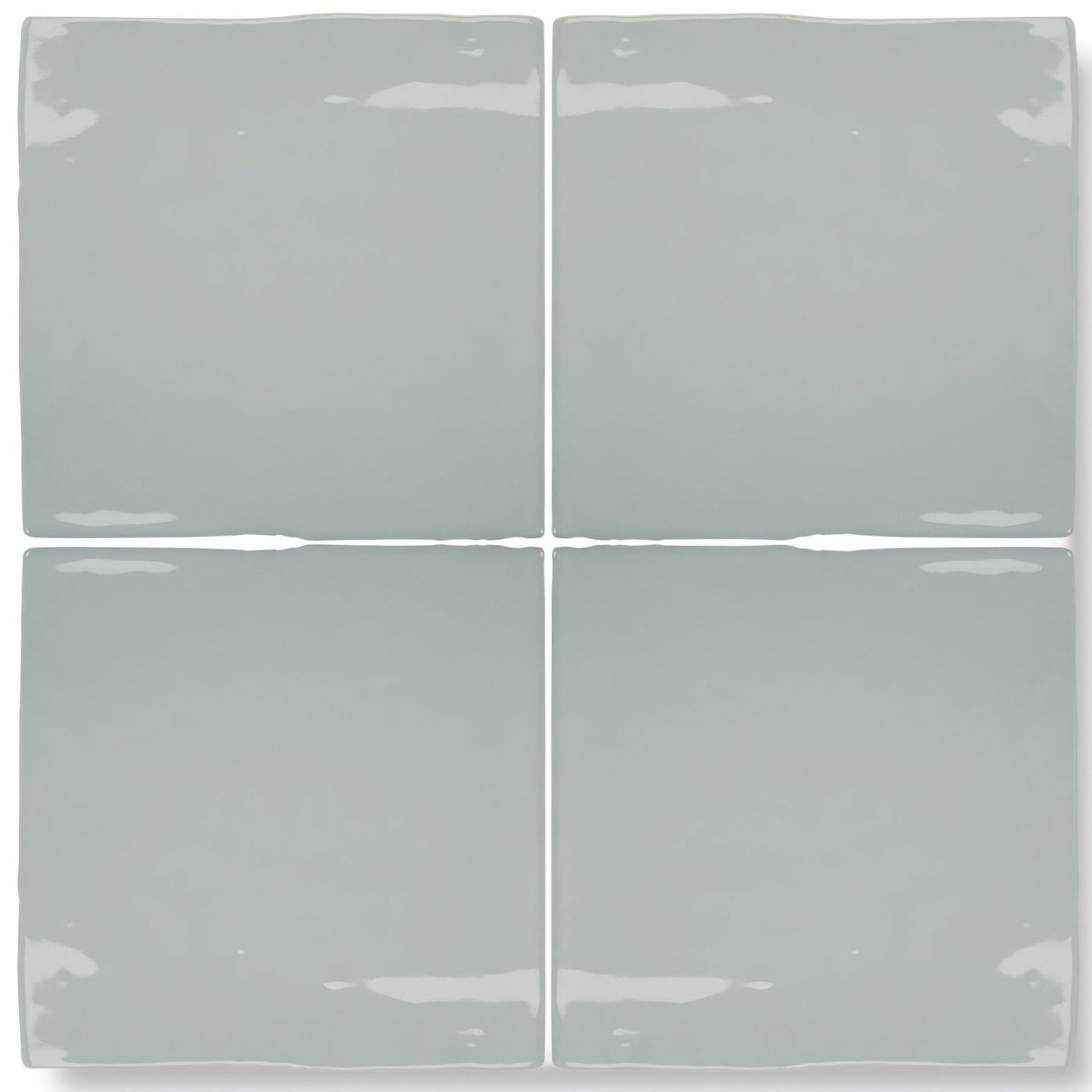 Set of four matte-finished light gray ceramic square tiles with slightly uneven edges from forecast rockall square glazed tile collection