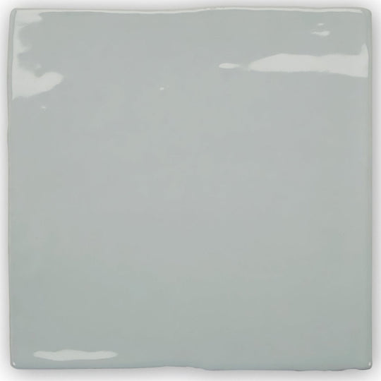 Forecast Rockall square glazed tile is a light gray glossy ceramic tile with subtle reflective highlights