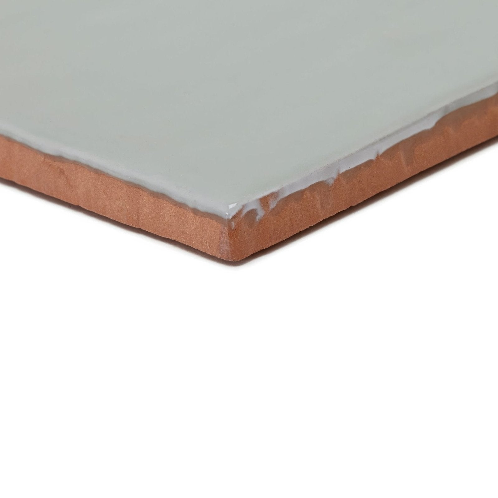 Forecast rockall square glazed tile showing a smooth matte gray ceramic surface with exposed terracotta clay edges