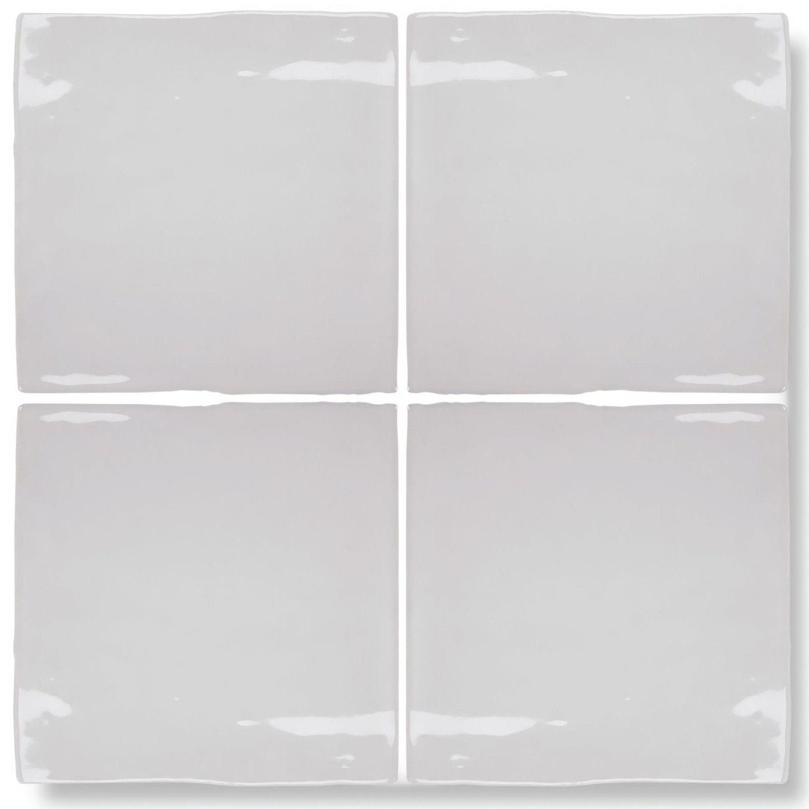 Set of four glossy white ceramic forecast sky square glazed tiles with slightly wavy edges for wall or floor use