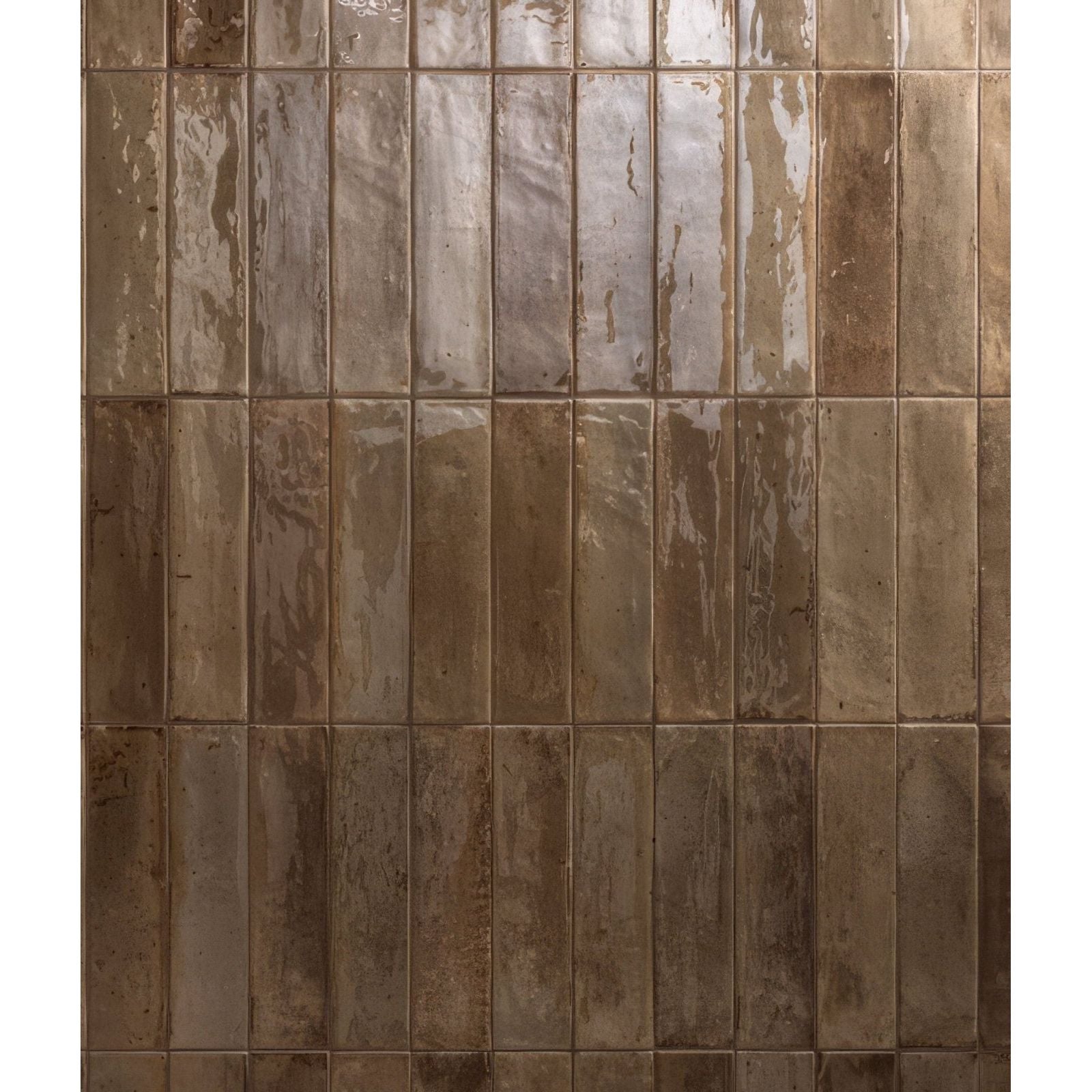Rectangular glossy brown porcelain tiles with a rustic glazed finish arranged in vertical rows for flooring or walls