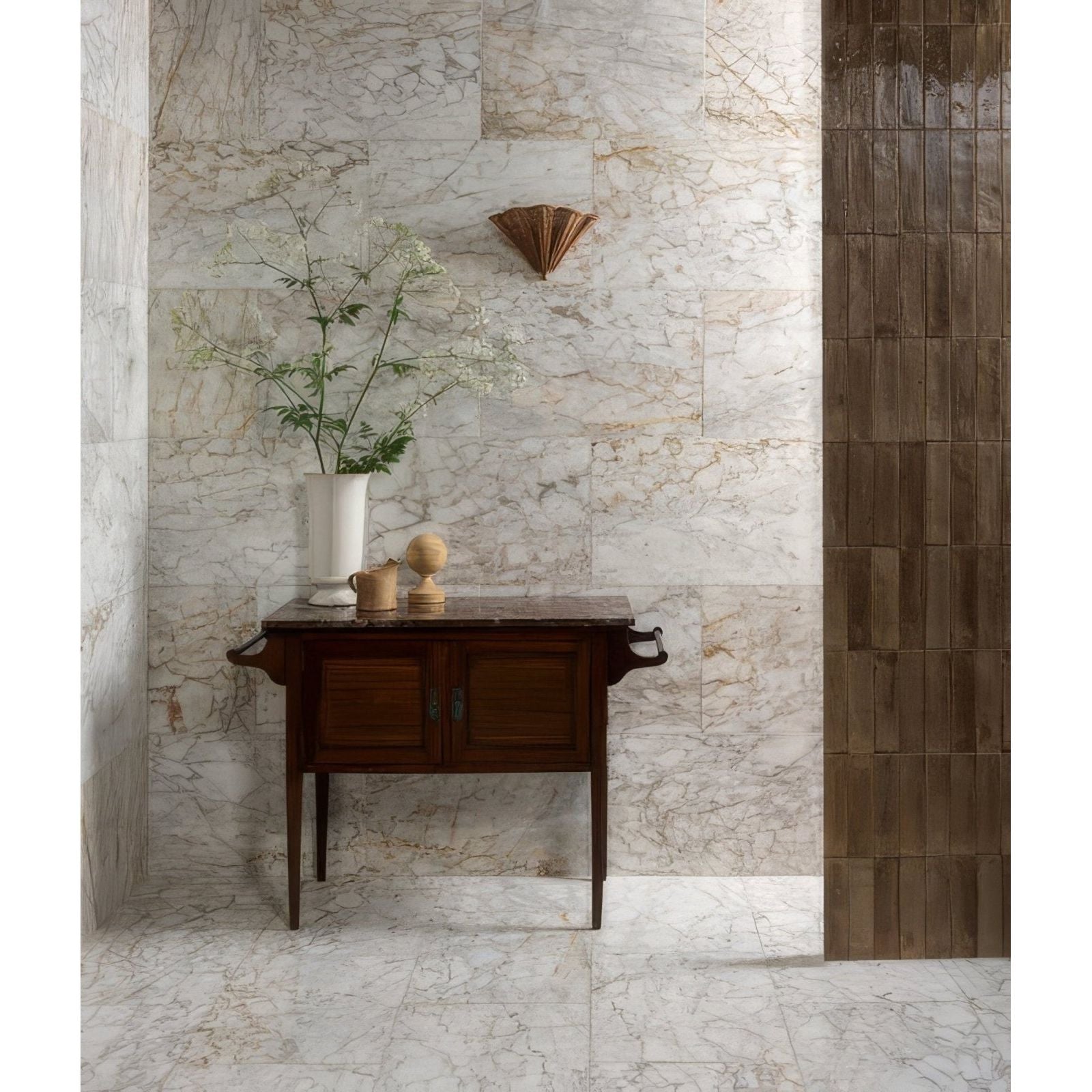 Dark wood console table with black metal handles and polished marble top featuring foundry novo porcelain beige finish