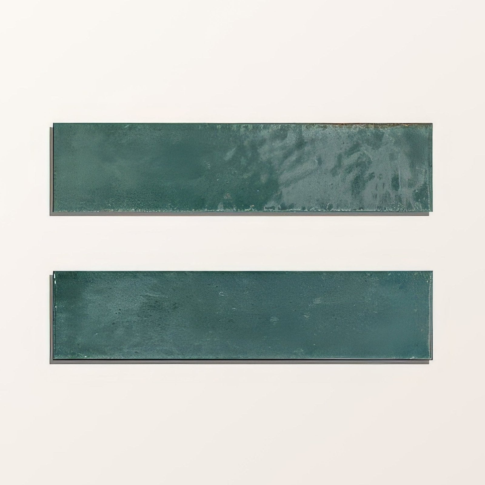 Two rectangular teal foundry novo porcelain turquoise ceramic tiles with a matte slightly textured finish