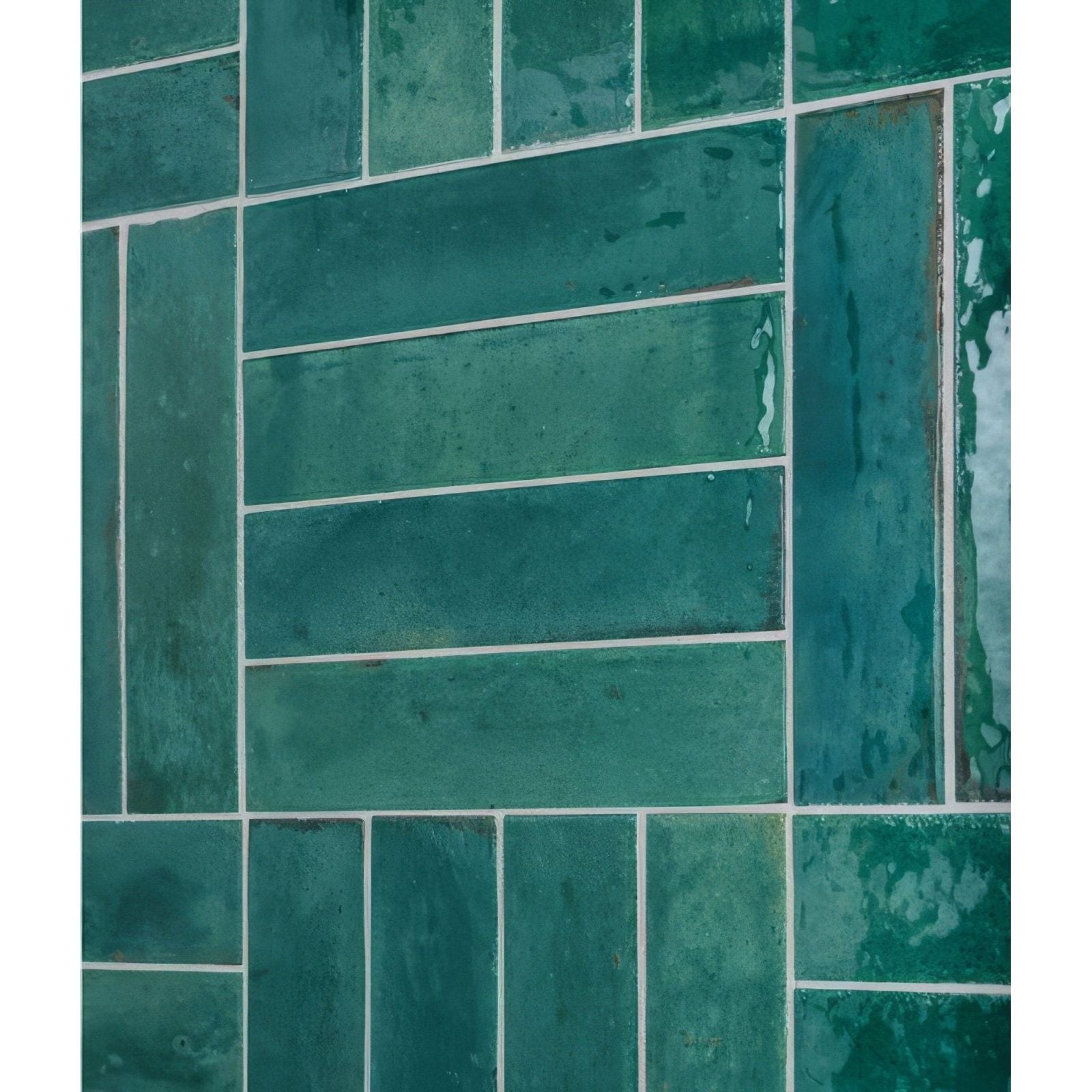 Teal-green rectangular glossy porcelain tiles with subtle hue variations in an offset pattern foundry novo turquoise