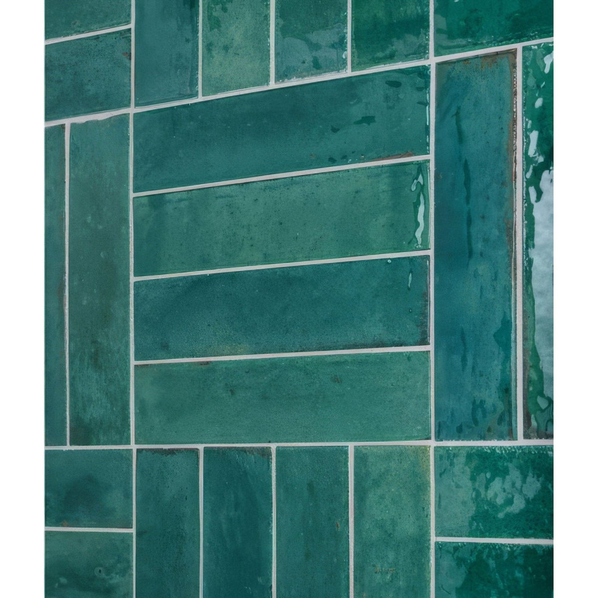Teal-green rectangular glossy porcelain tiles with subtle hue variations in an offset pattern foundry novo turquoise