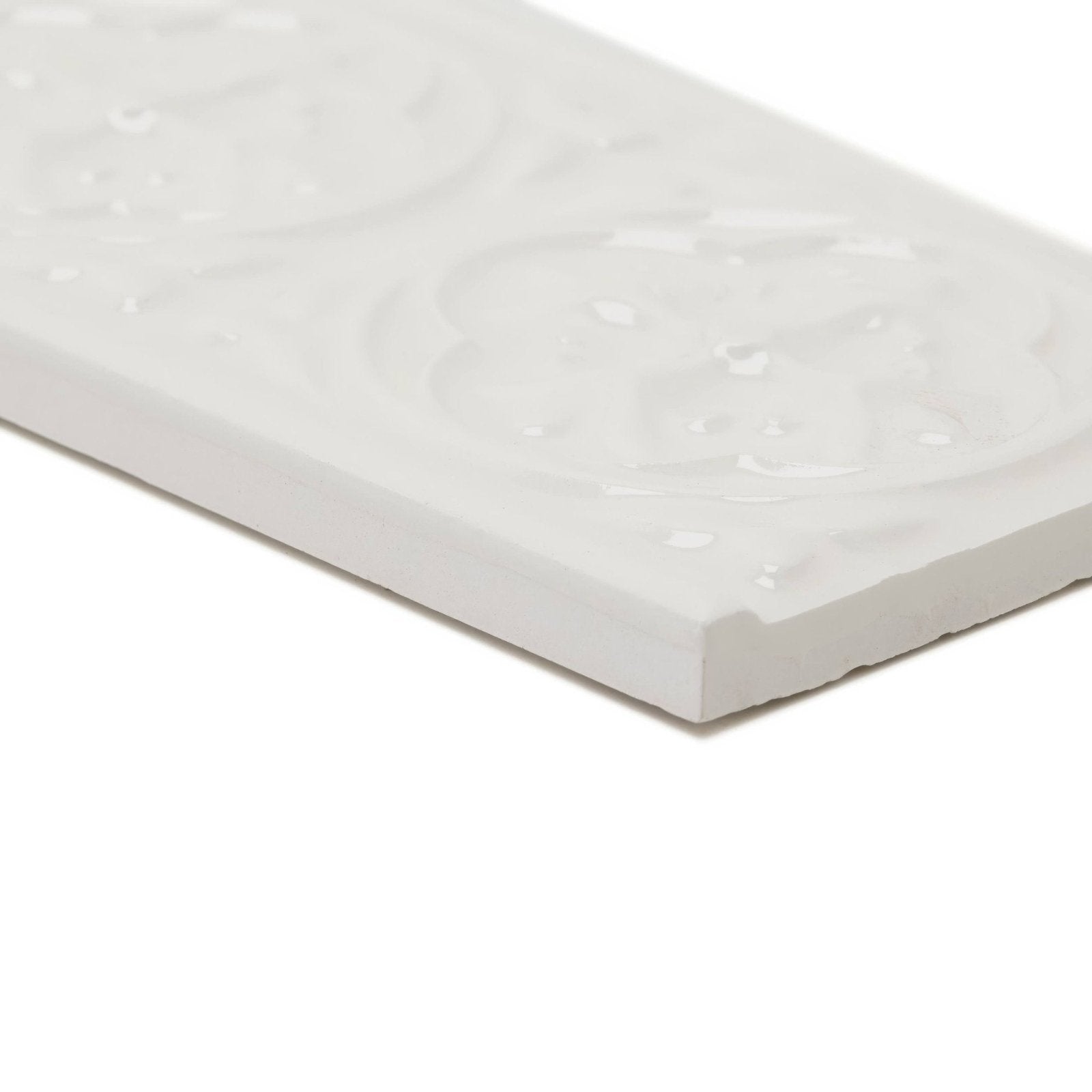 White ceramic tile giralda cascara cream border with embossed floral pattern for decorative wall accents