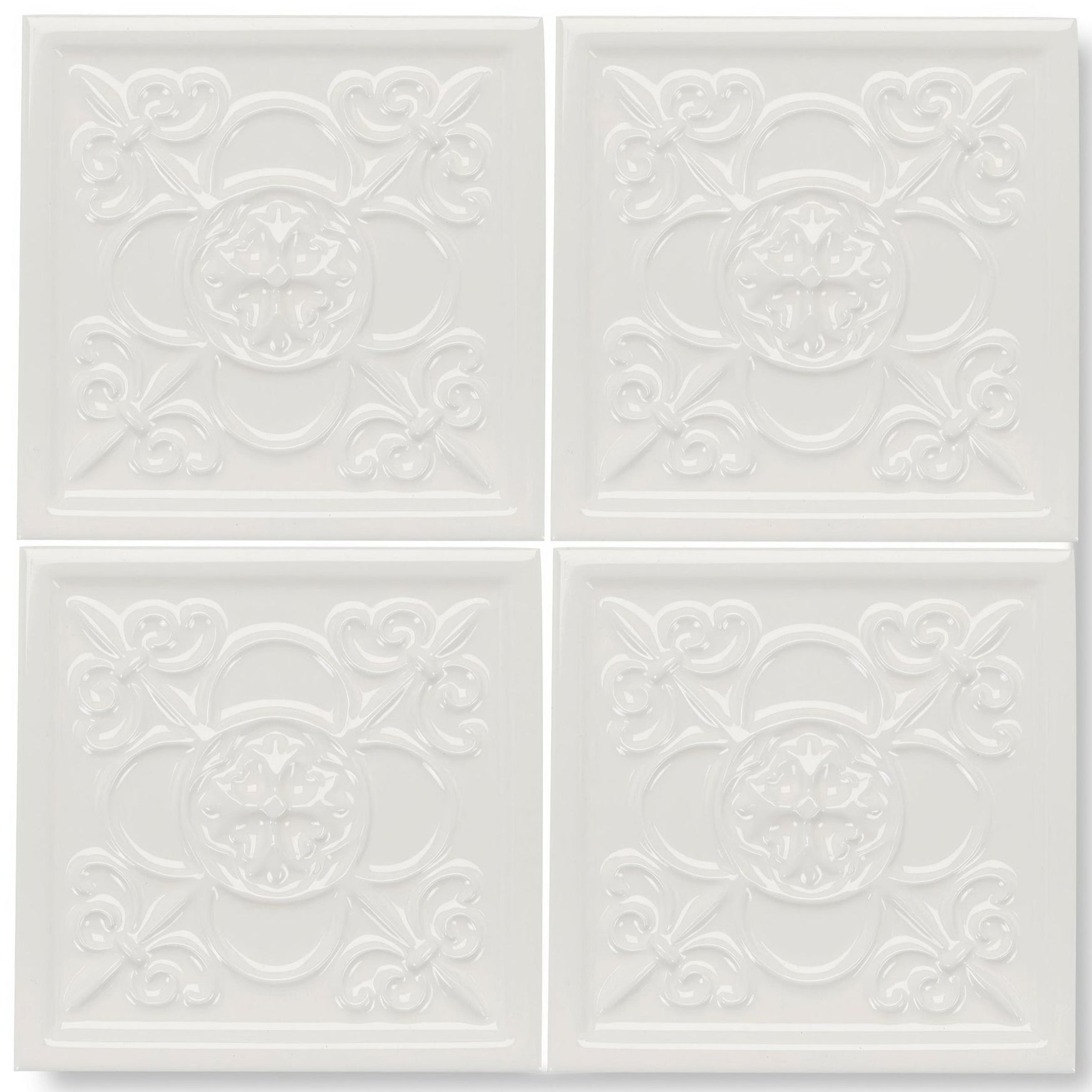 White ceramic giralda cascara cream decor tile with raised ornate floral and scrollwork patterns