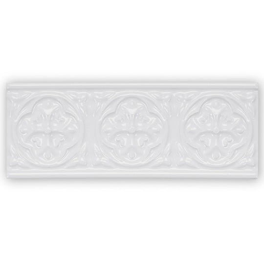 White ceramic tile giralda hielo white border with three embossed floral medallions for decorative use