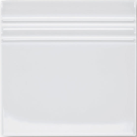 White ceramic square plate with glossy finish and three horizontal ridges from giralda hielo white skirting collection