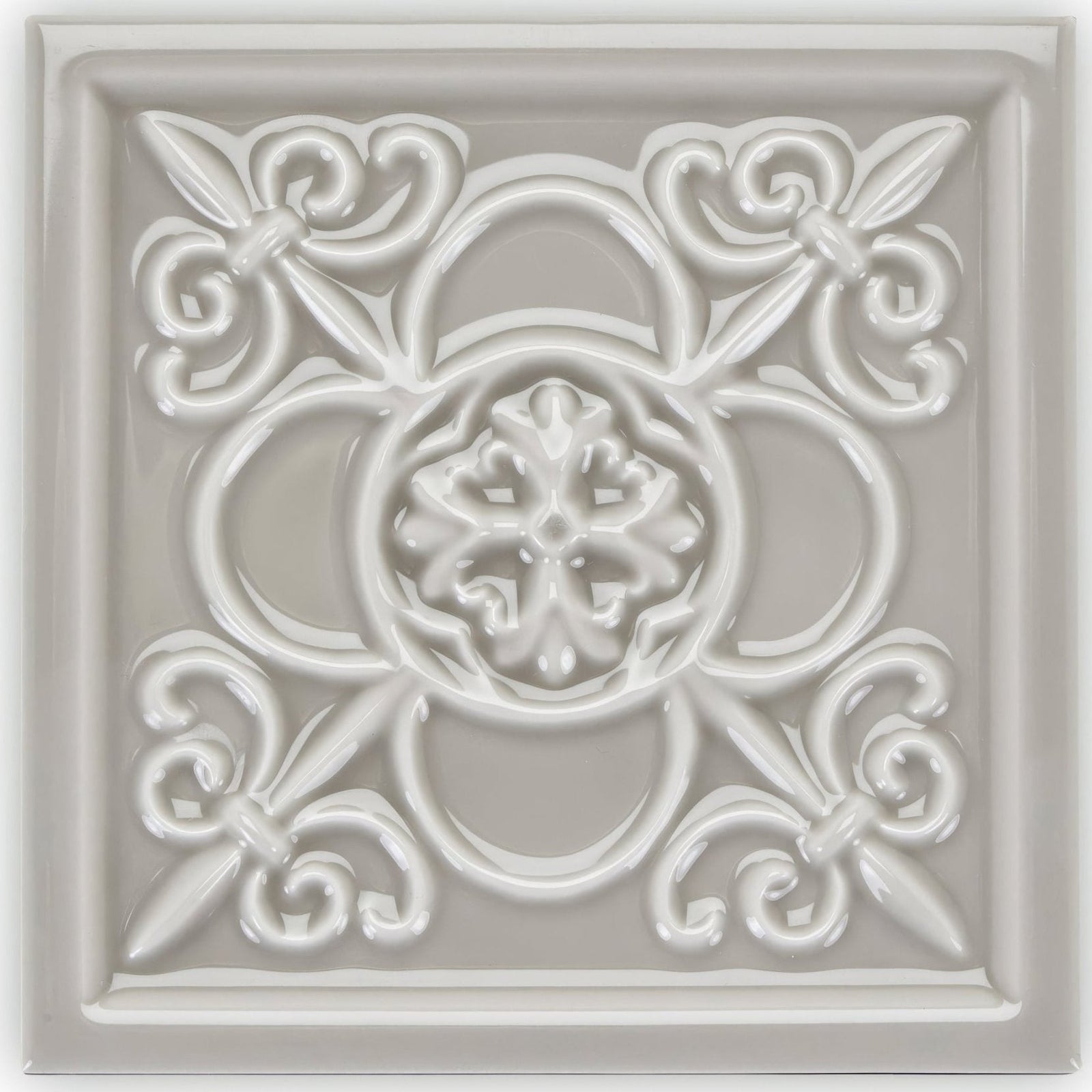 Giralda Niebla Grey off-white ceramic decor tile with ornate raised floral and scrollwork design
