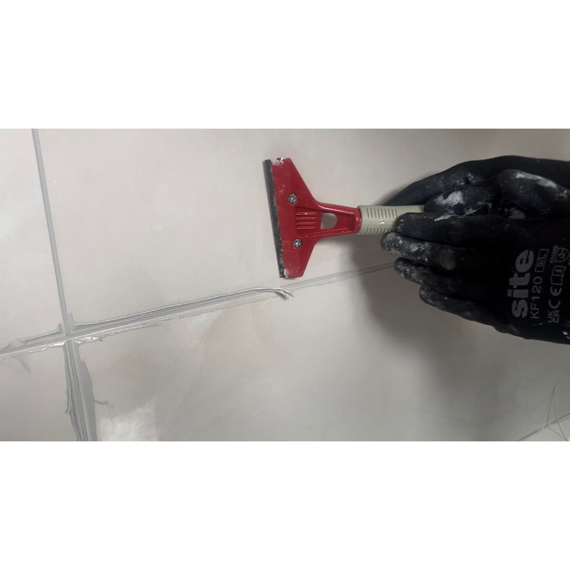 Red and gray sitg mf120 tile scraper with rubberized grip handle for use with gopoxy epoxy grout applications
